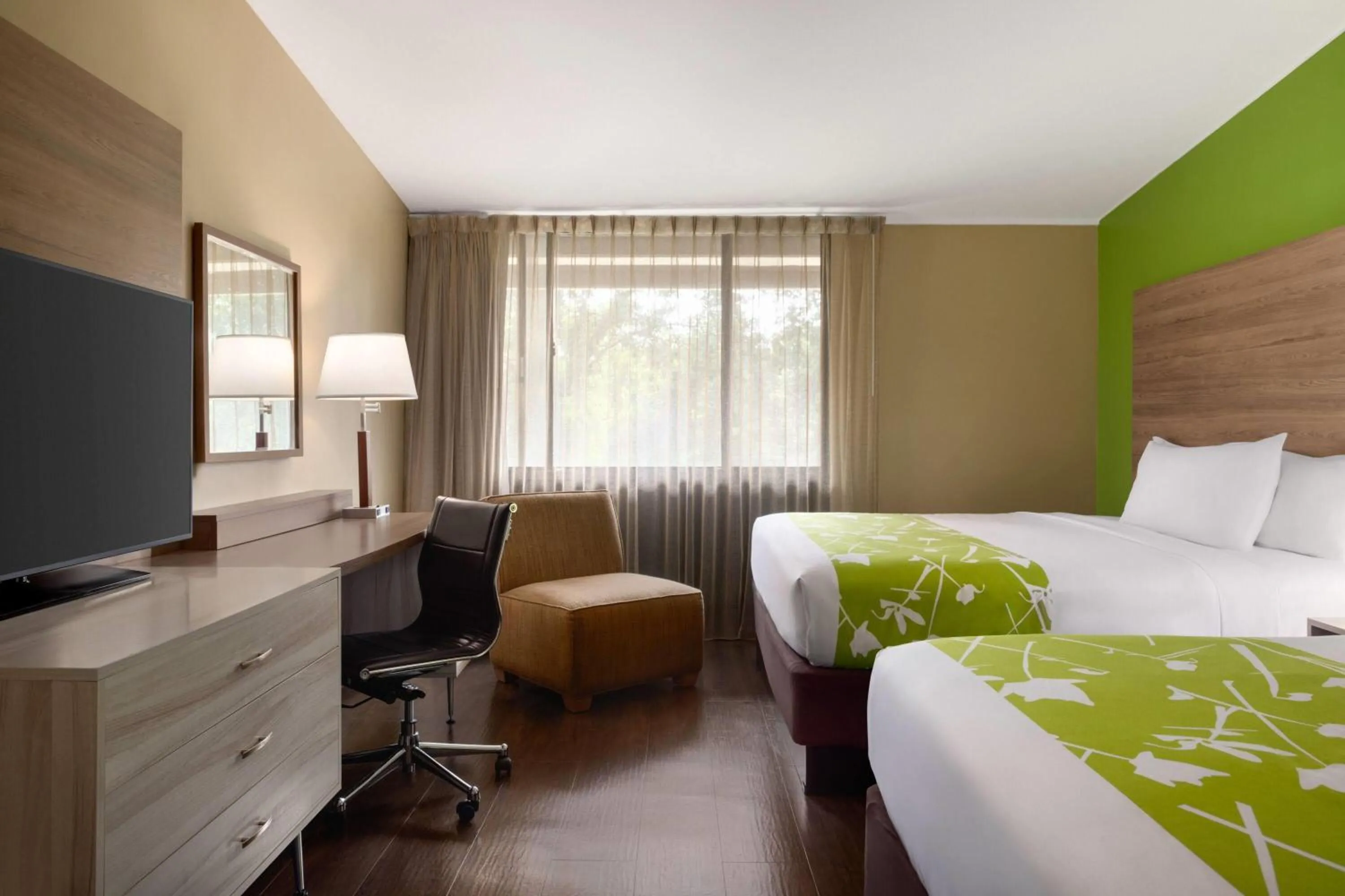 Photo of the whole room, Bed in Wyndham Garden Washington DC North