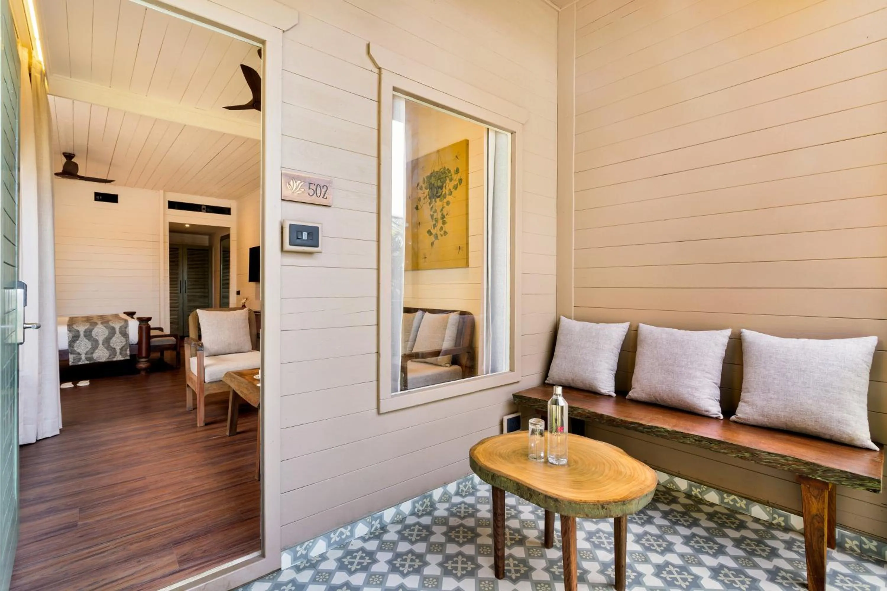 Seating area, Bed in Riva Beach Resort