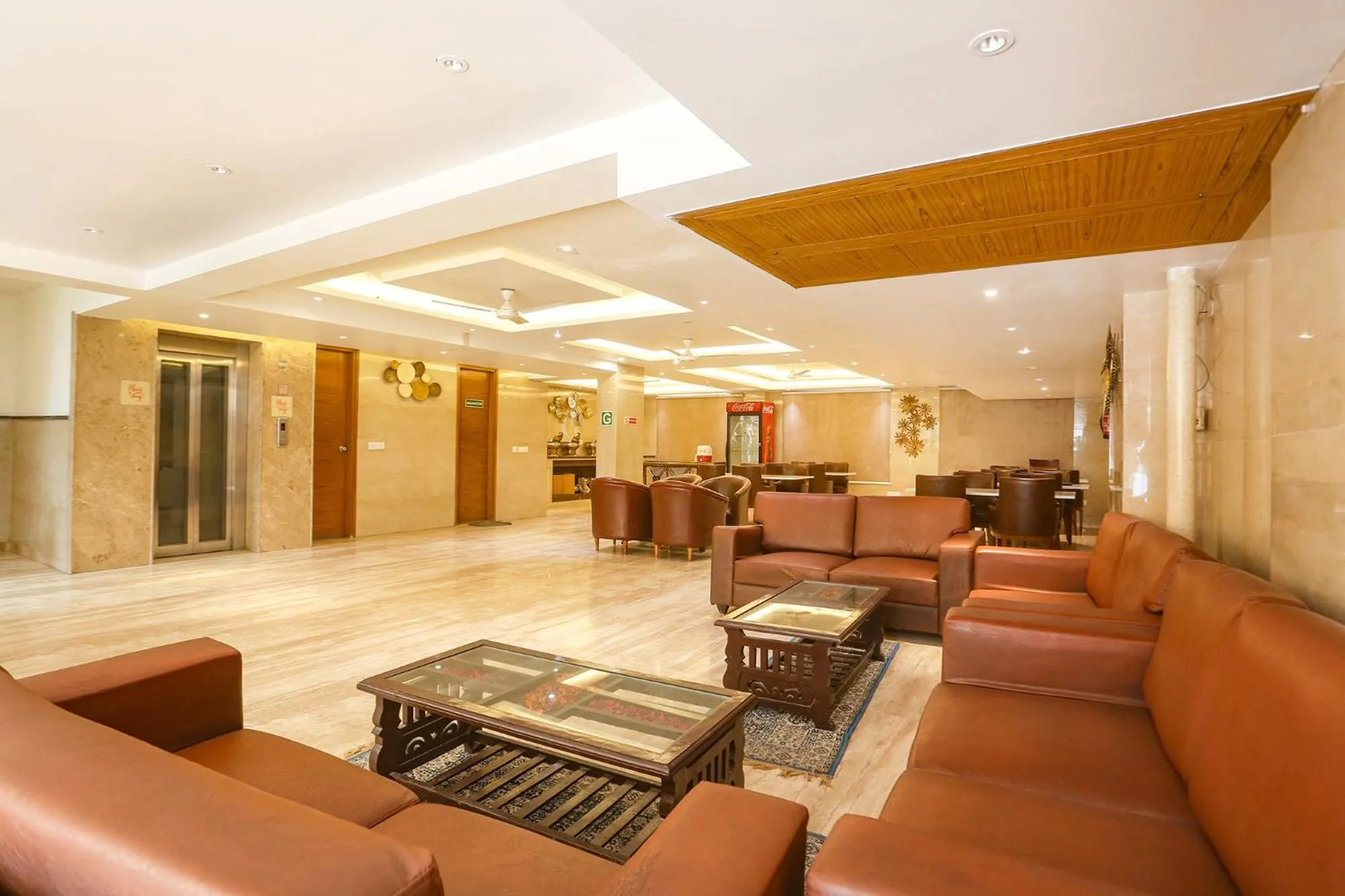 Seating area in FabHotel Prime Star 17 - Nr Yashobhoomi Convention Centre