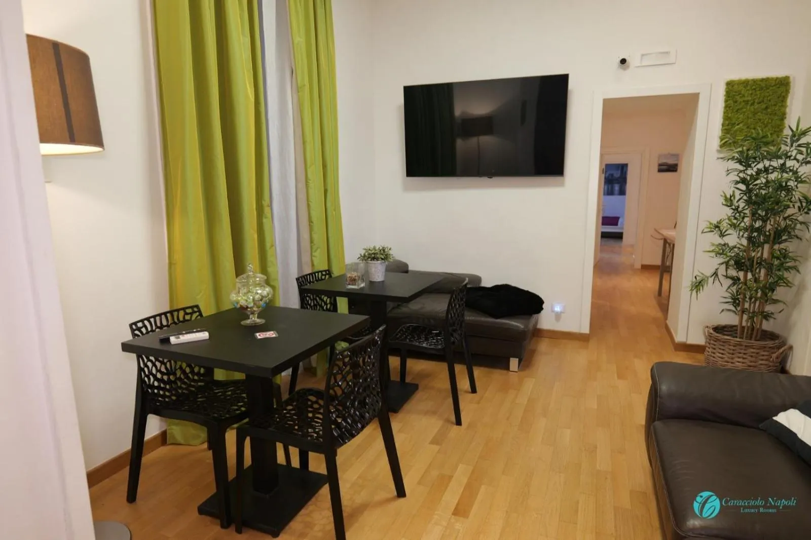 Communal lounge/ TV room in Caracciolo Napoli BeB