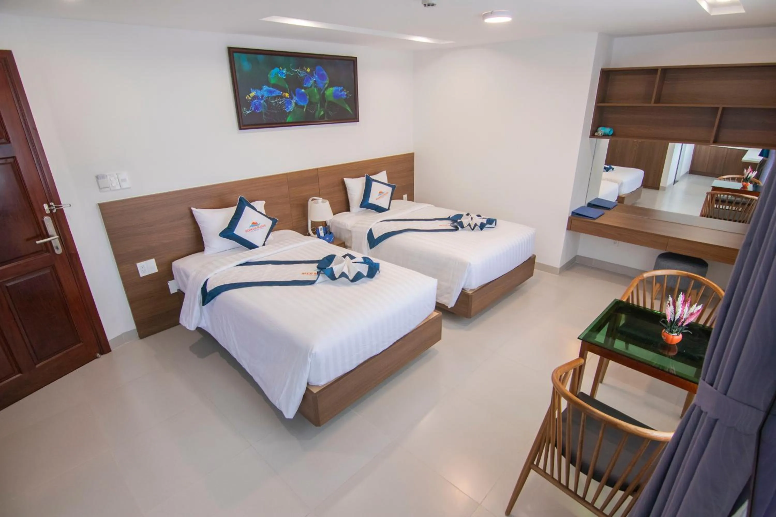 Bed in Mermaid Seaside Hotel