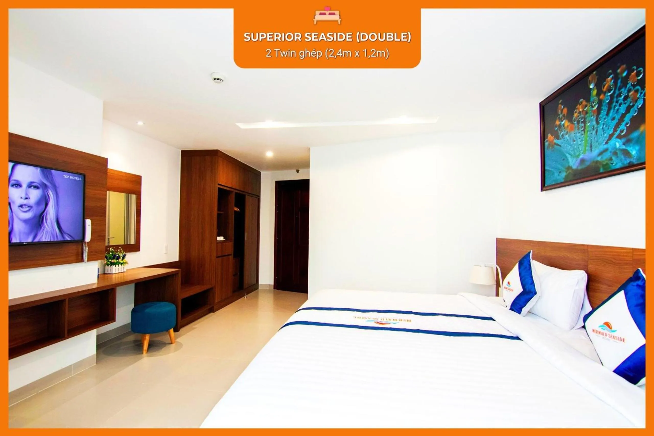 Bed in Mermaid Seaside Hotel