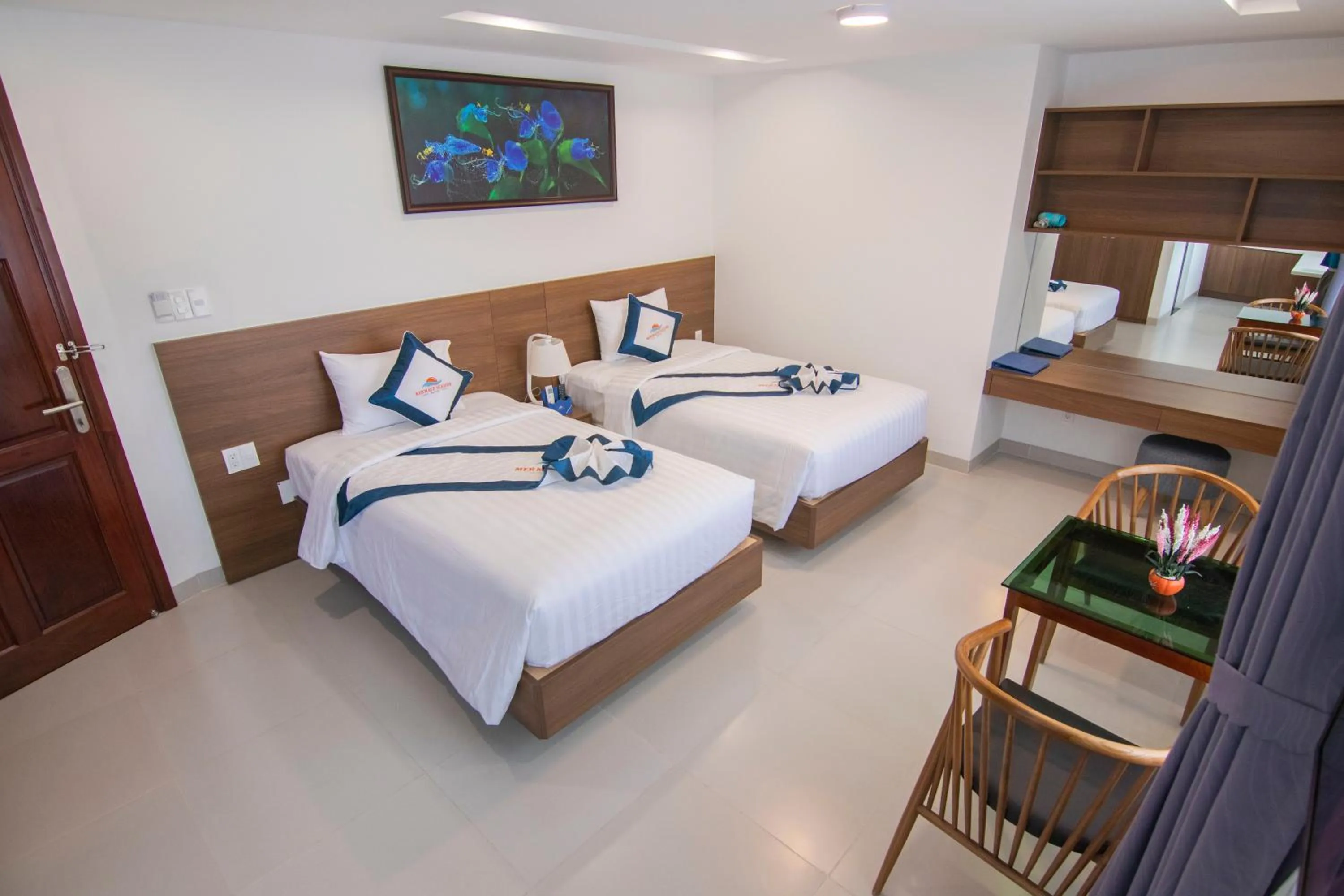 Bed in Mermaid Seaside Hotel