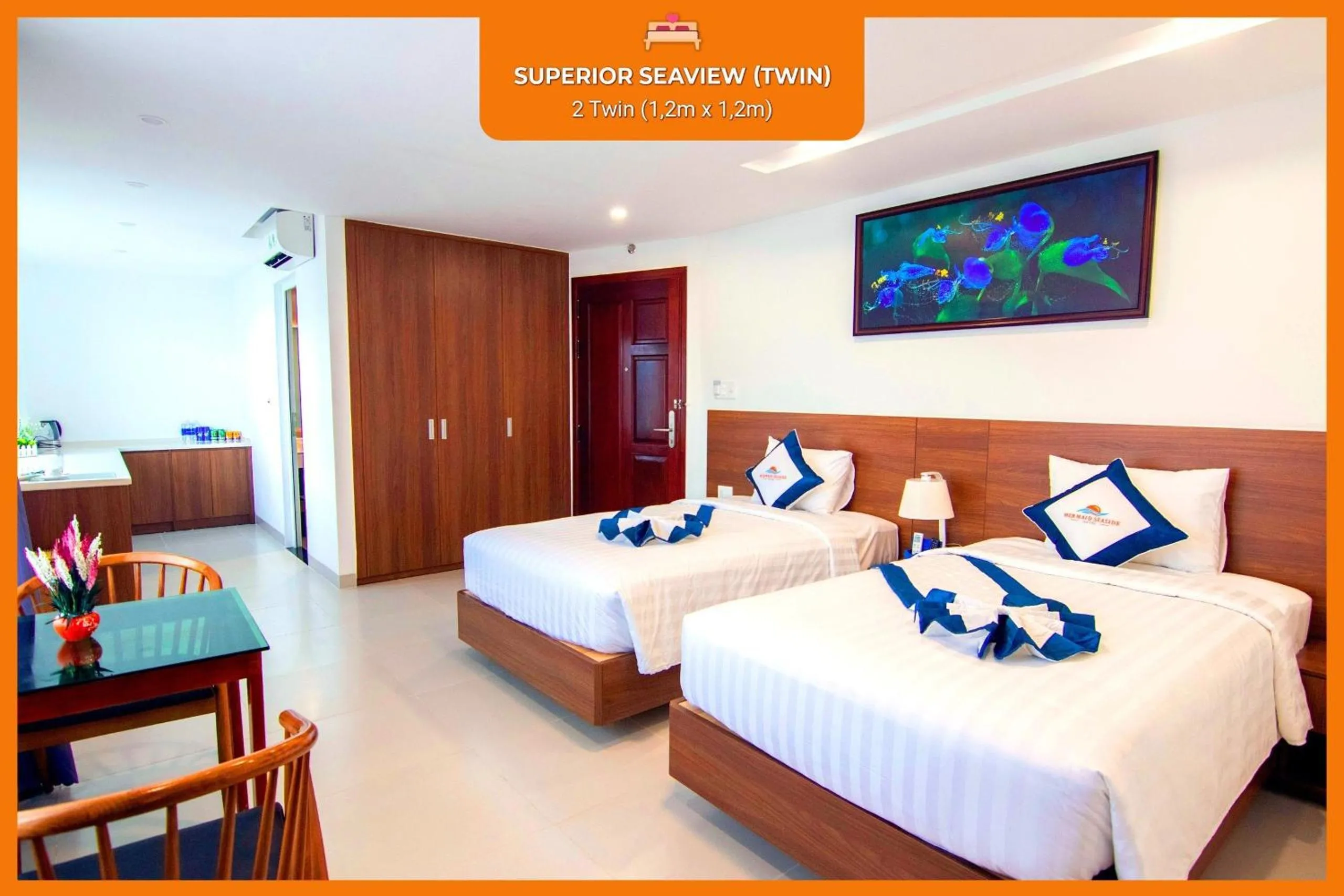 Bed in Mermaid Seaside Hotel