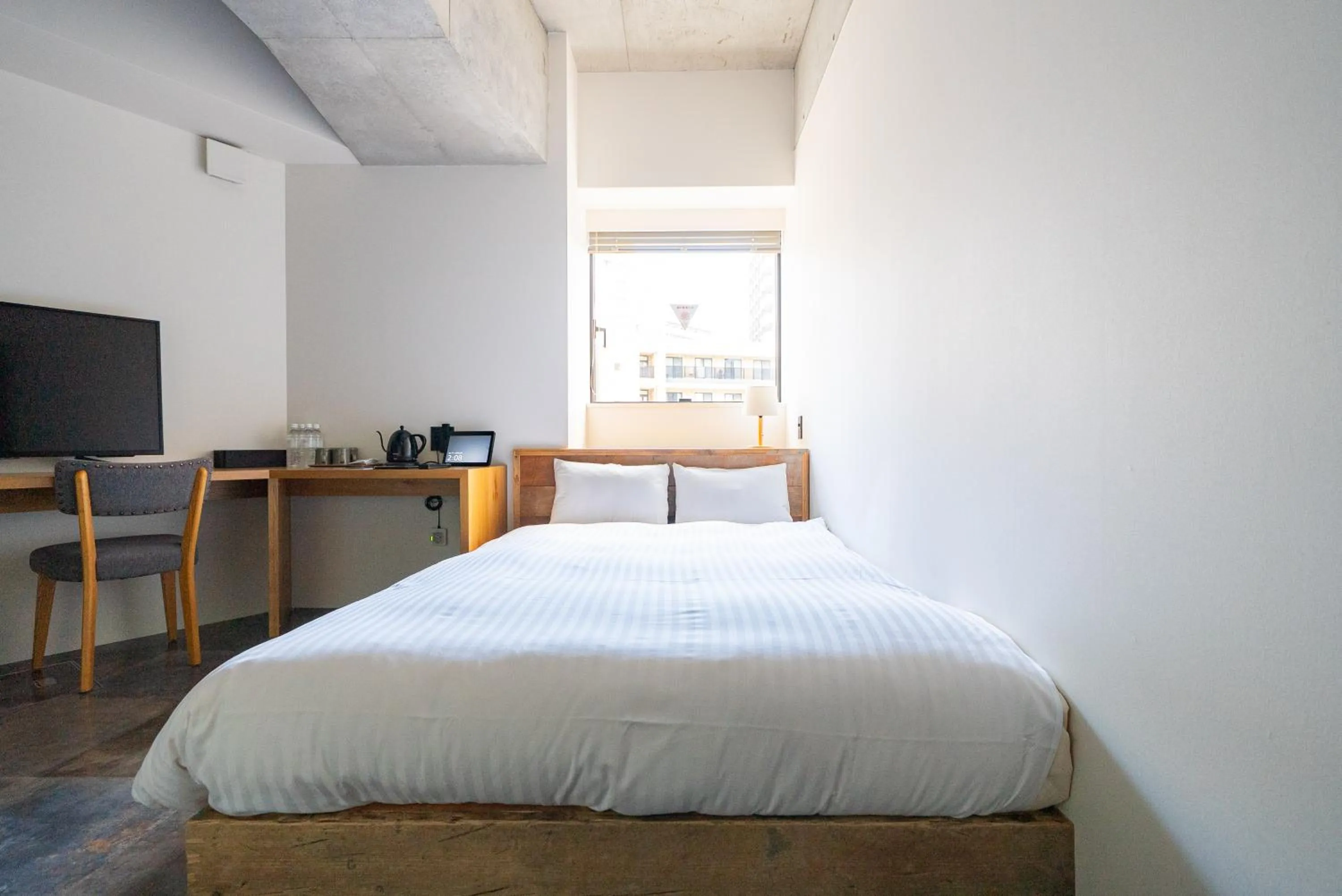 Bed in Hotel Mei Fukuoka Tenjin