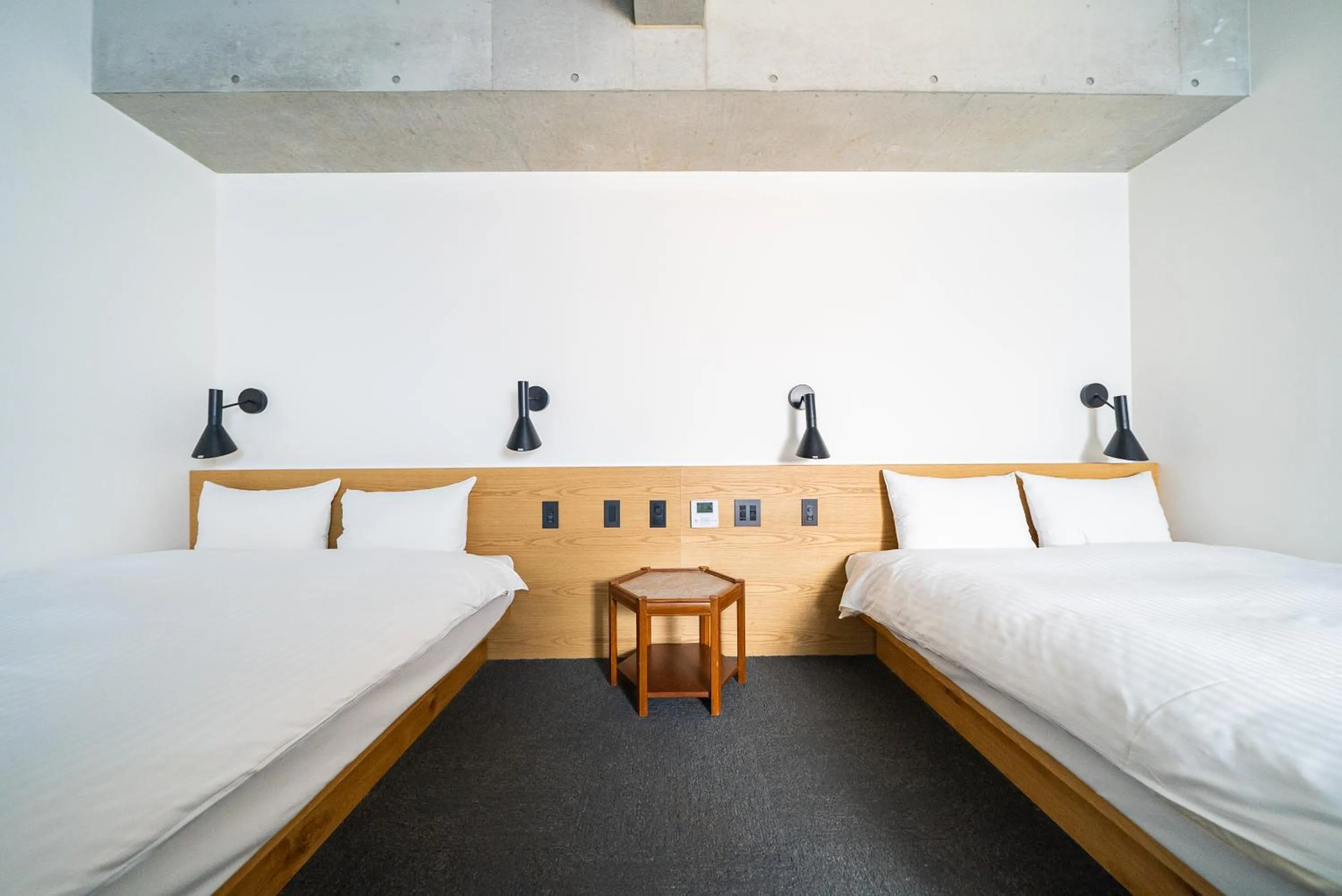 Bed in Hotel Mei Fukuoka Tenjin