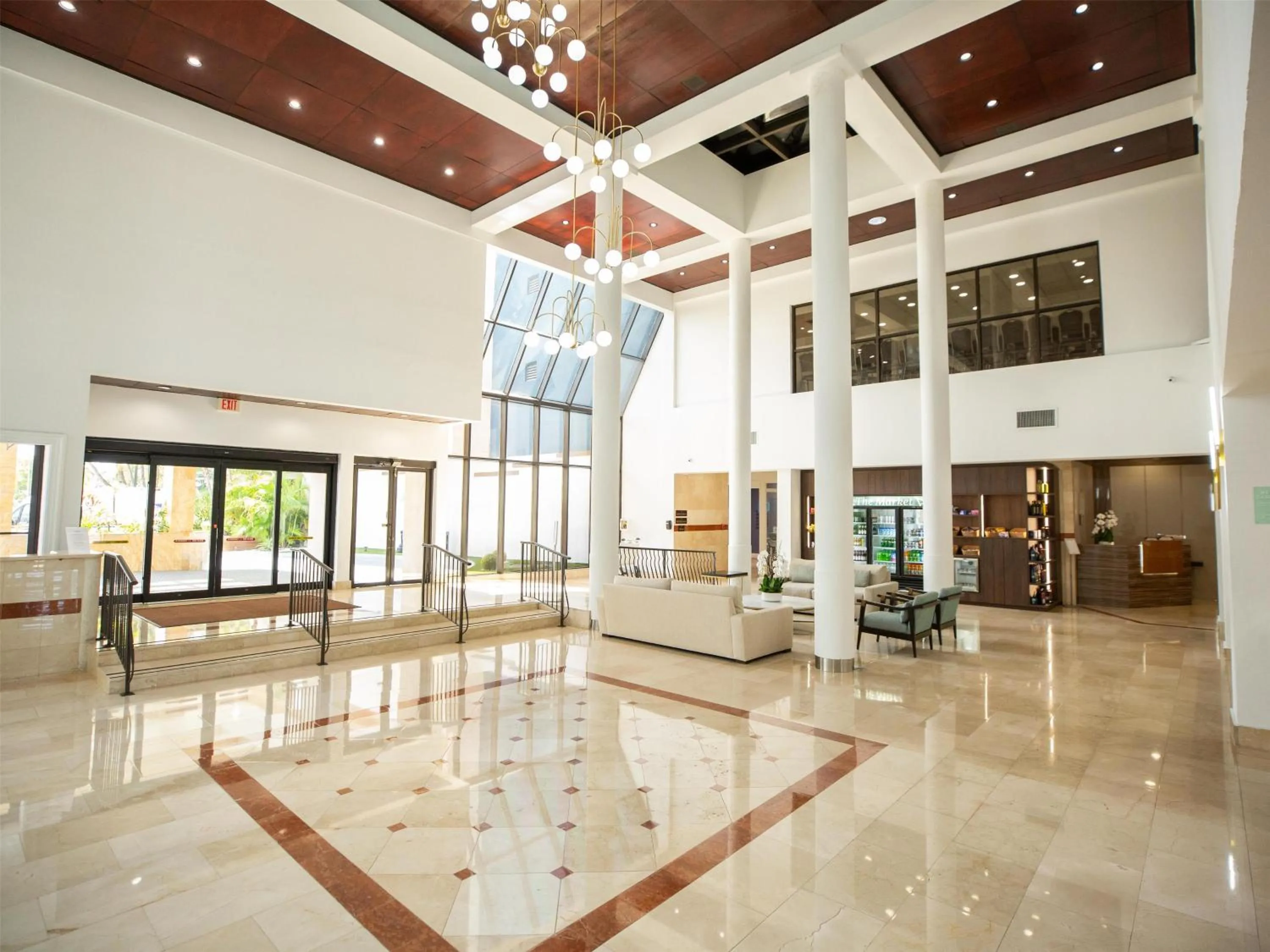 Lobby or reception in Regency Miami Airport by Sonesta