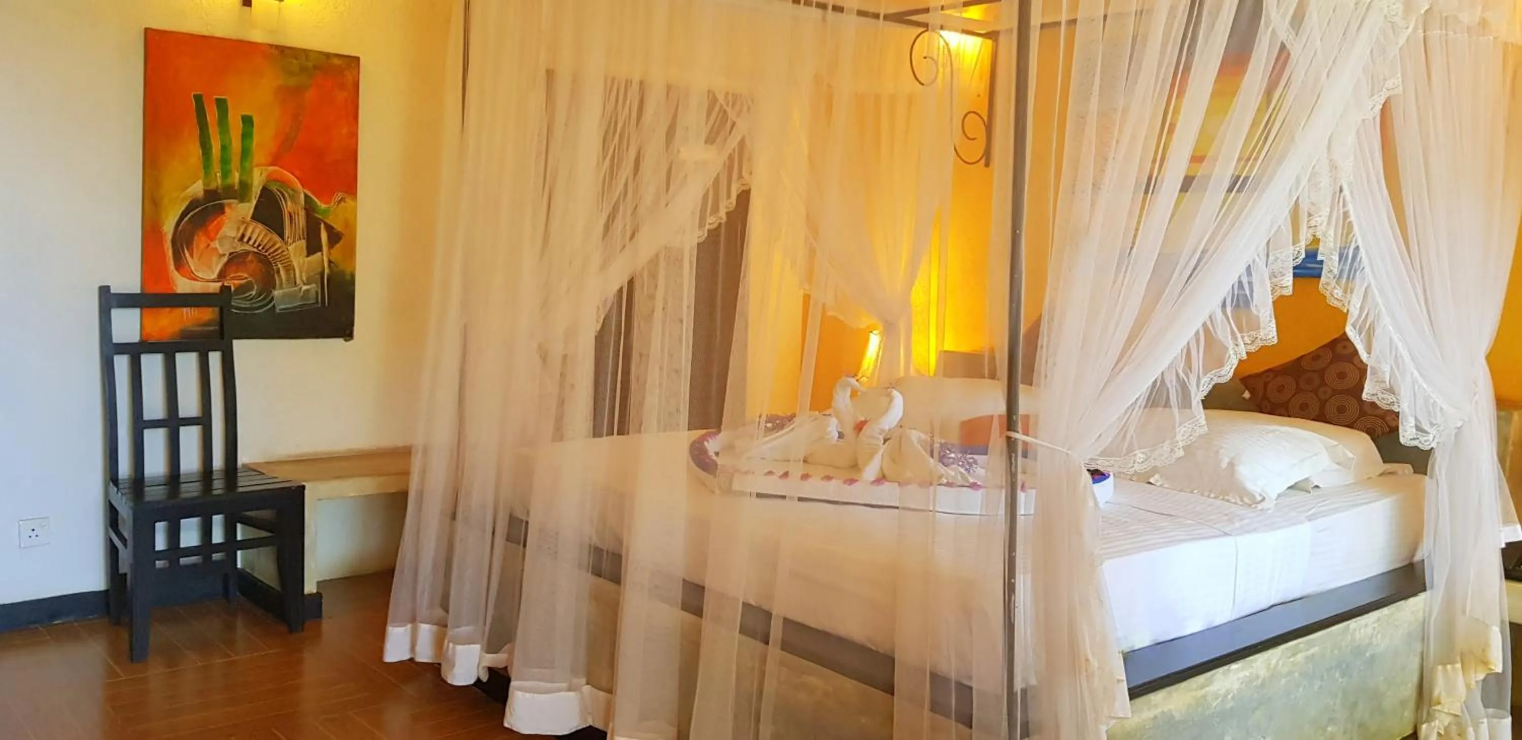 Bed in Flower Garden Lake Resort