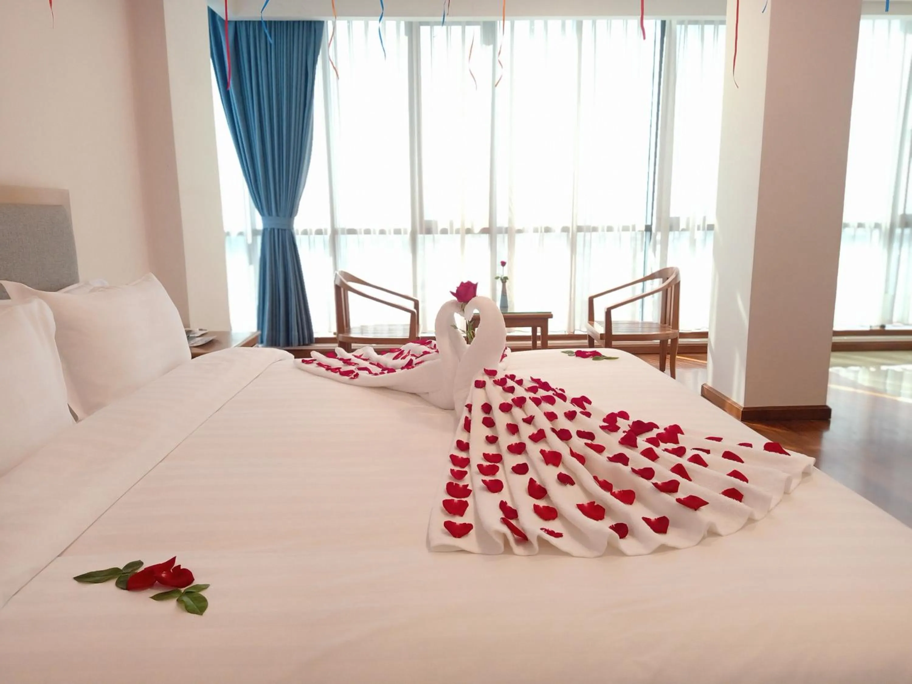 Bed in Dragon Phoenix Hotel