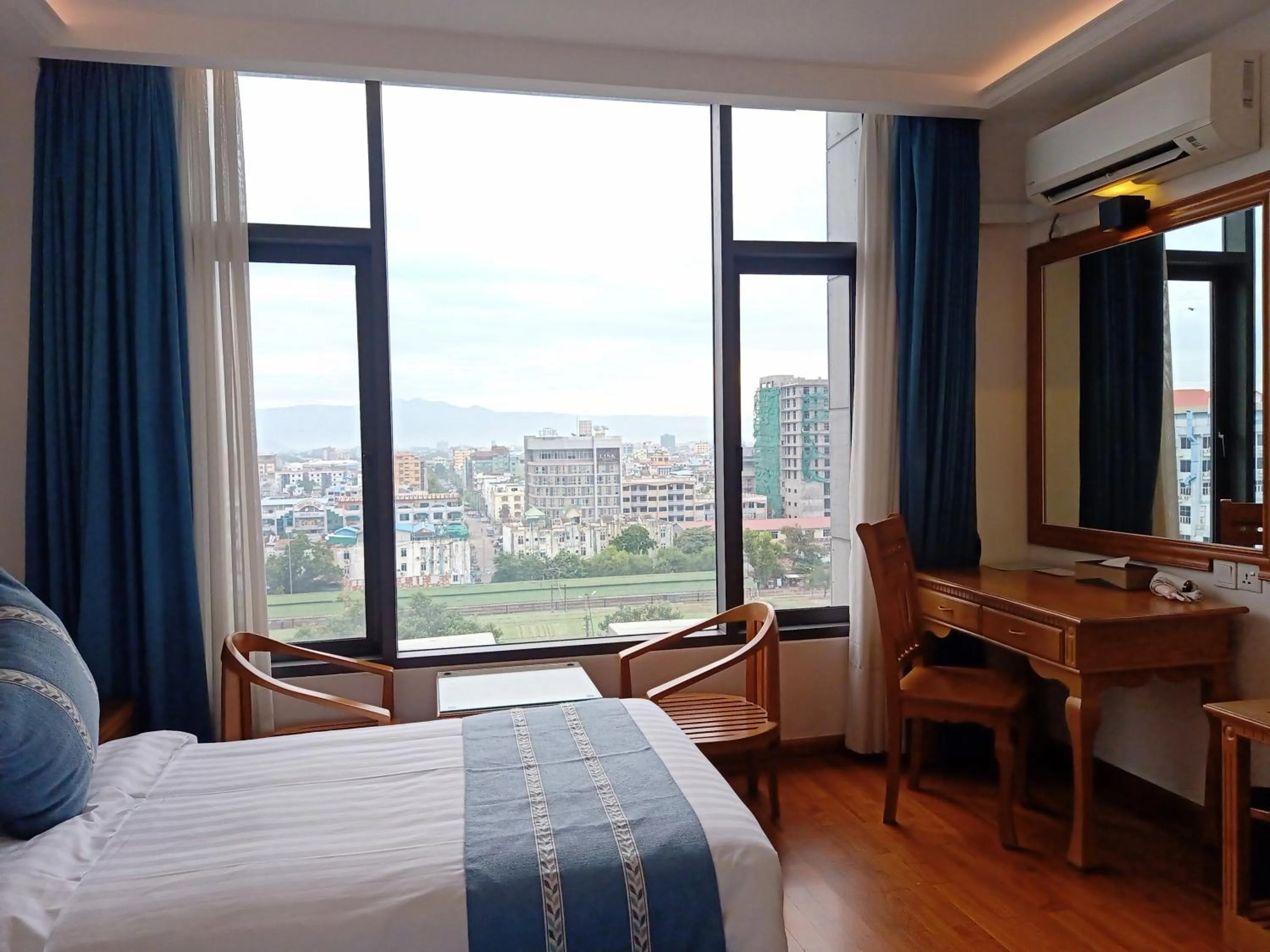 Bed in Dragon Phoenix Hotel