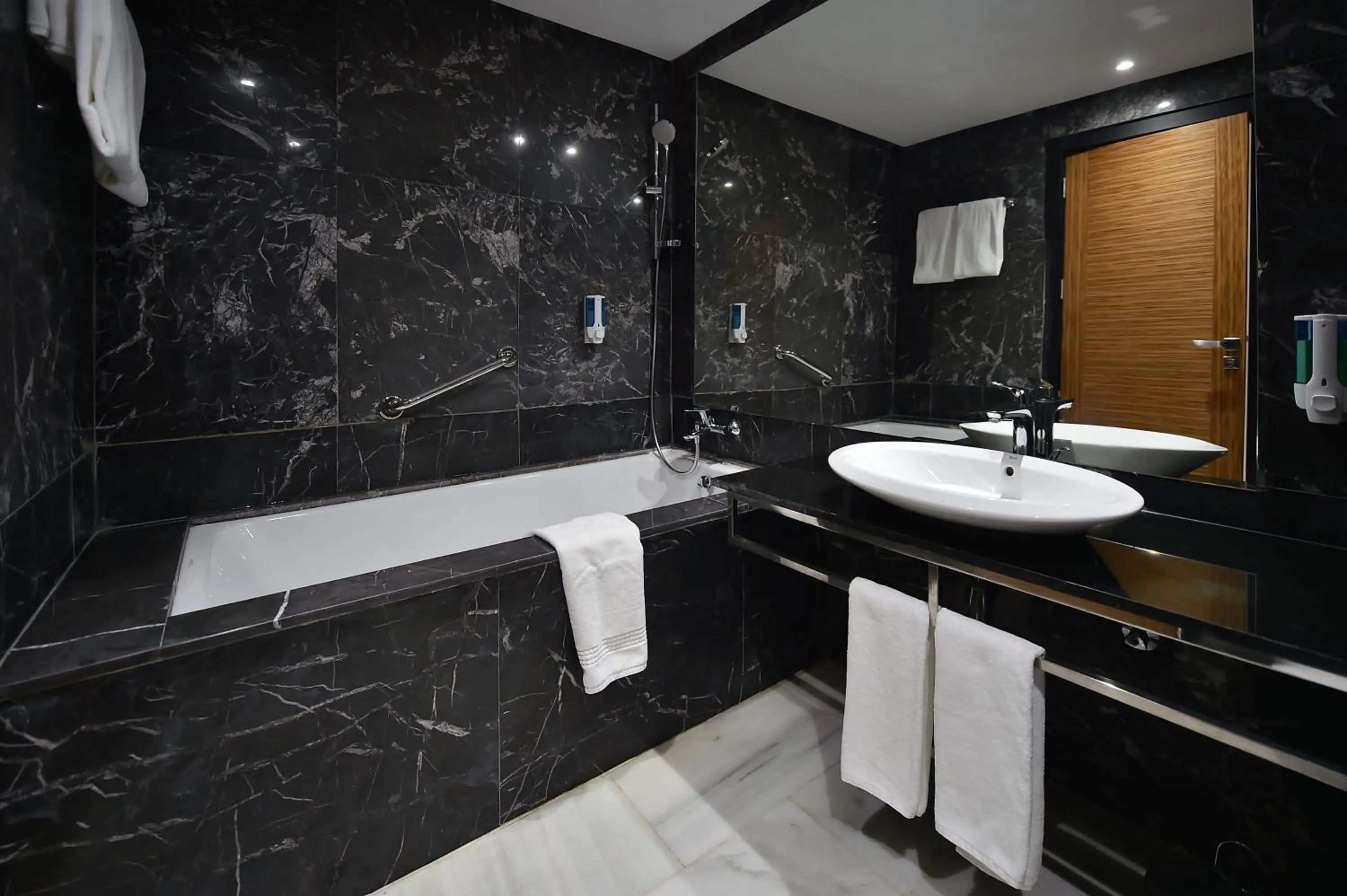 Bathroom in Le Yacht Suites Hotel
