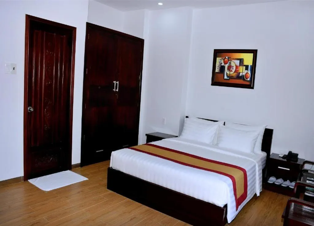 Bed in Dac Tin Luxury Hotel