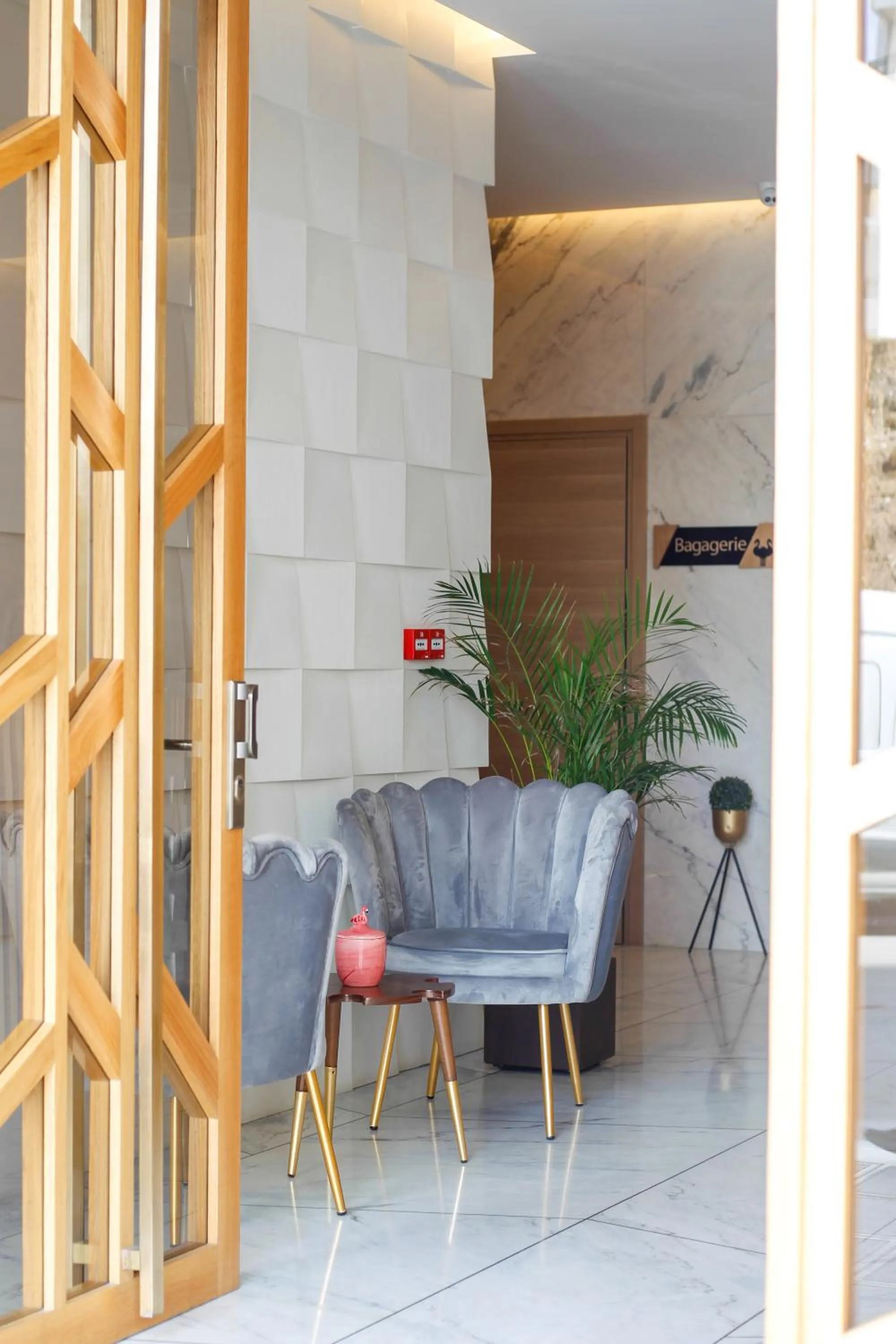 Lobby or reception in Flamant Rose Appart Hotel