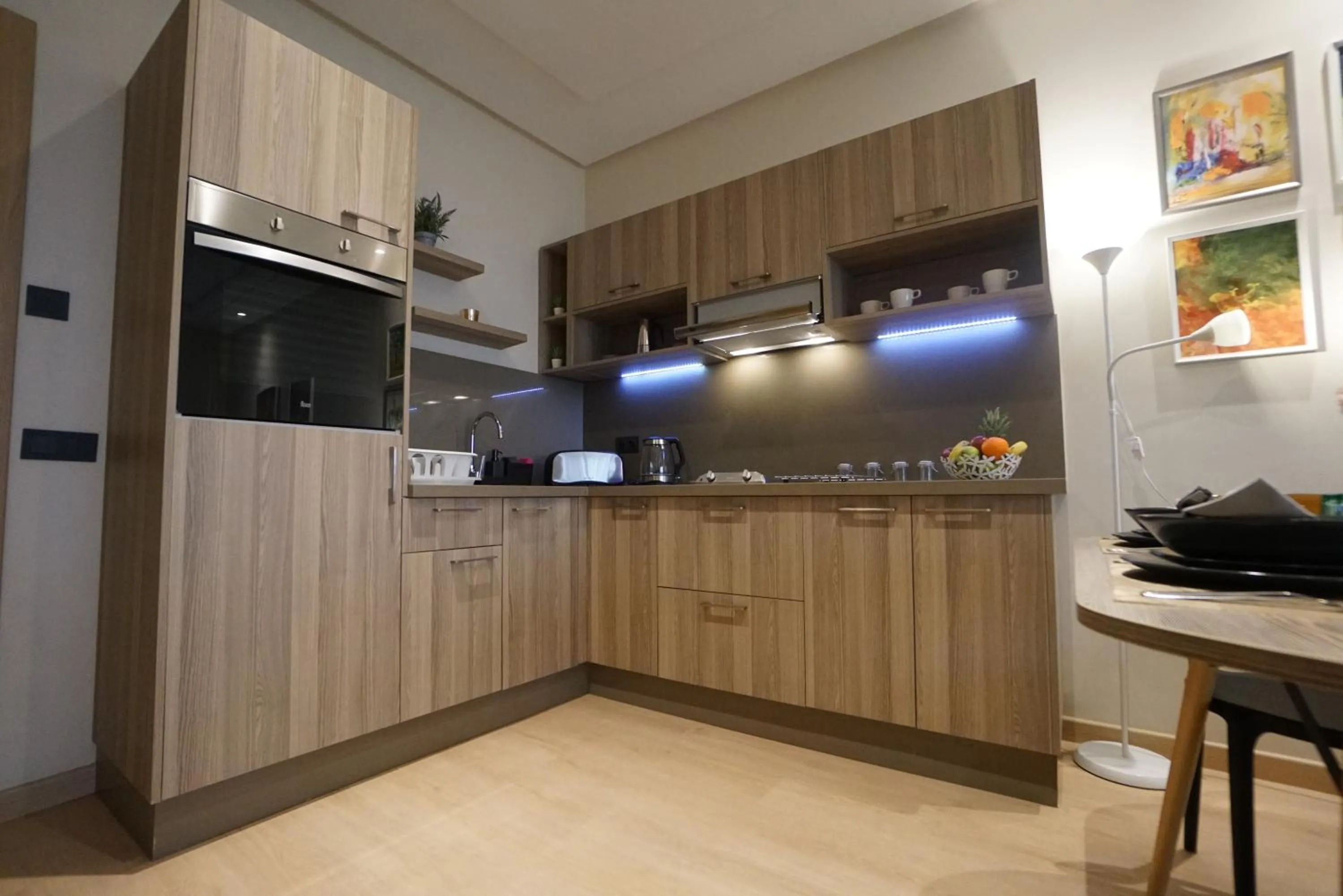 Kitchen or kitchenette in Flamant Rose Appart Hotel