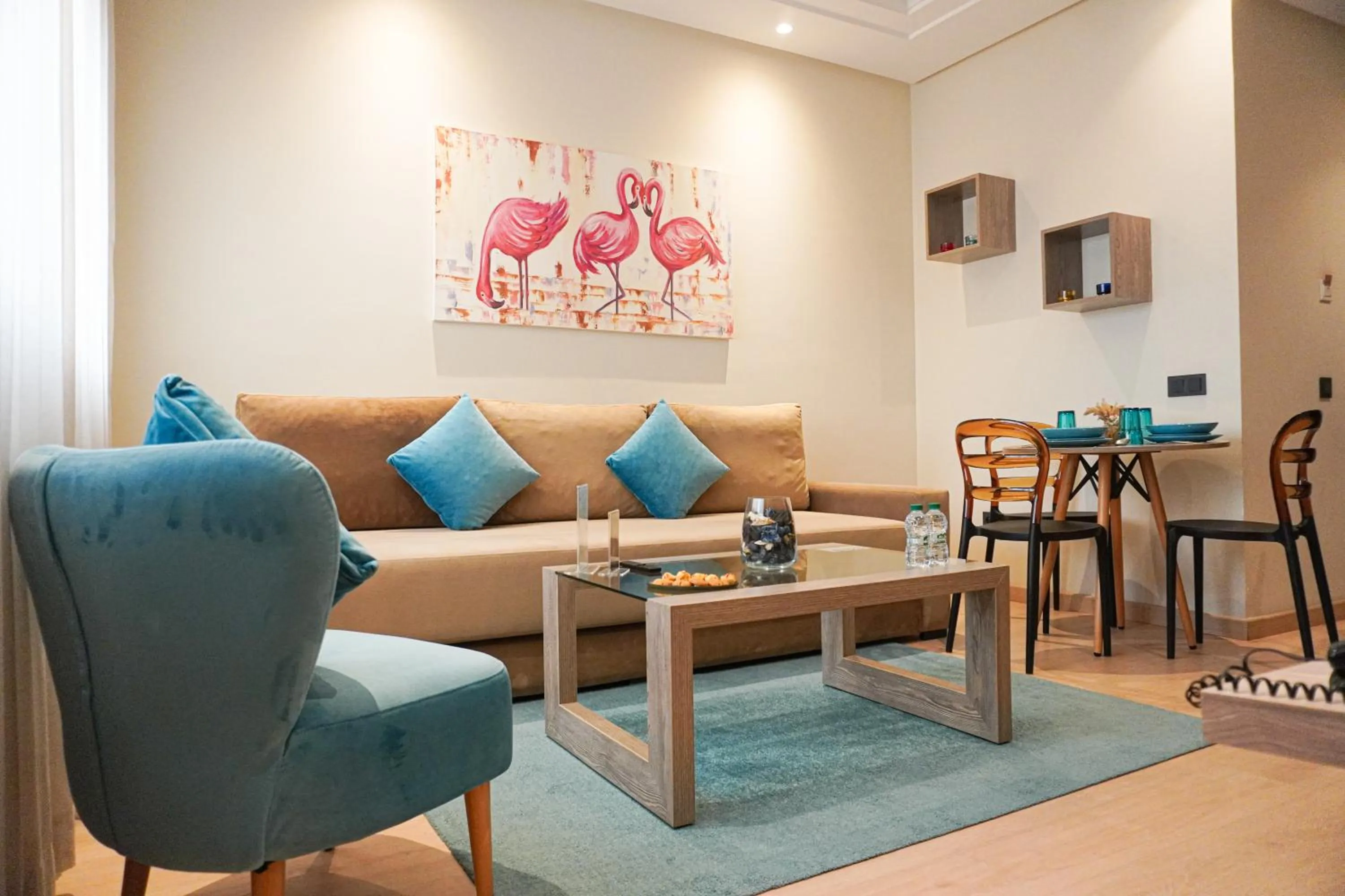 Living room in Flamant Rose Appart Hotel