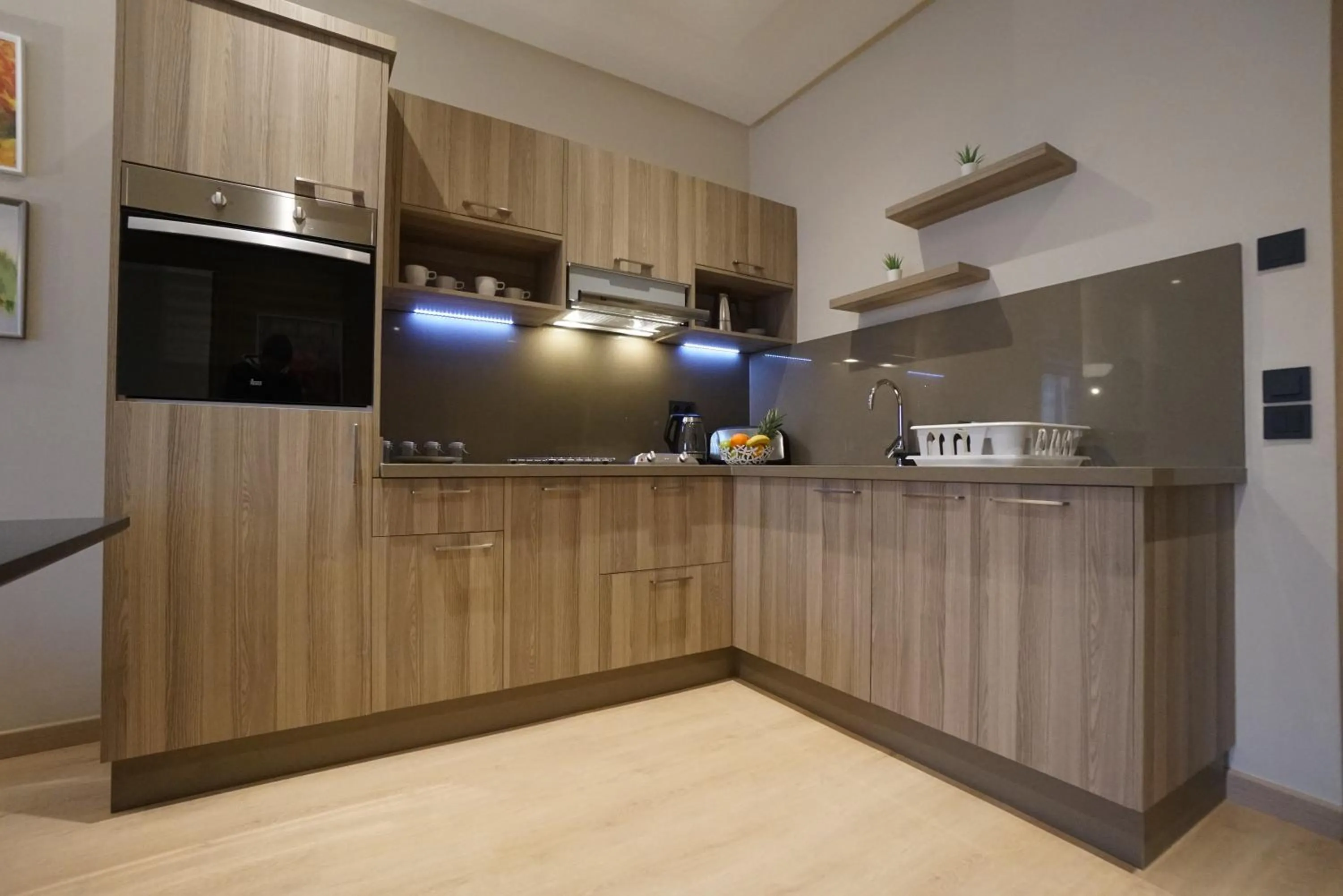 Kitchen or kitchenette in Flamant Rose Appart Hotel