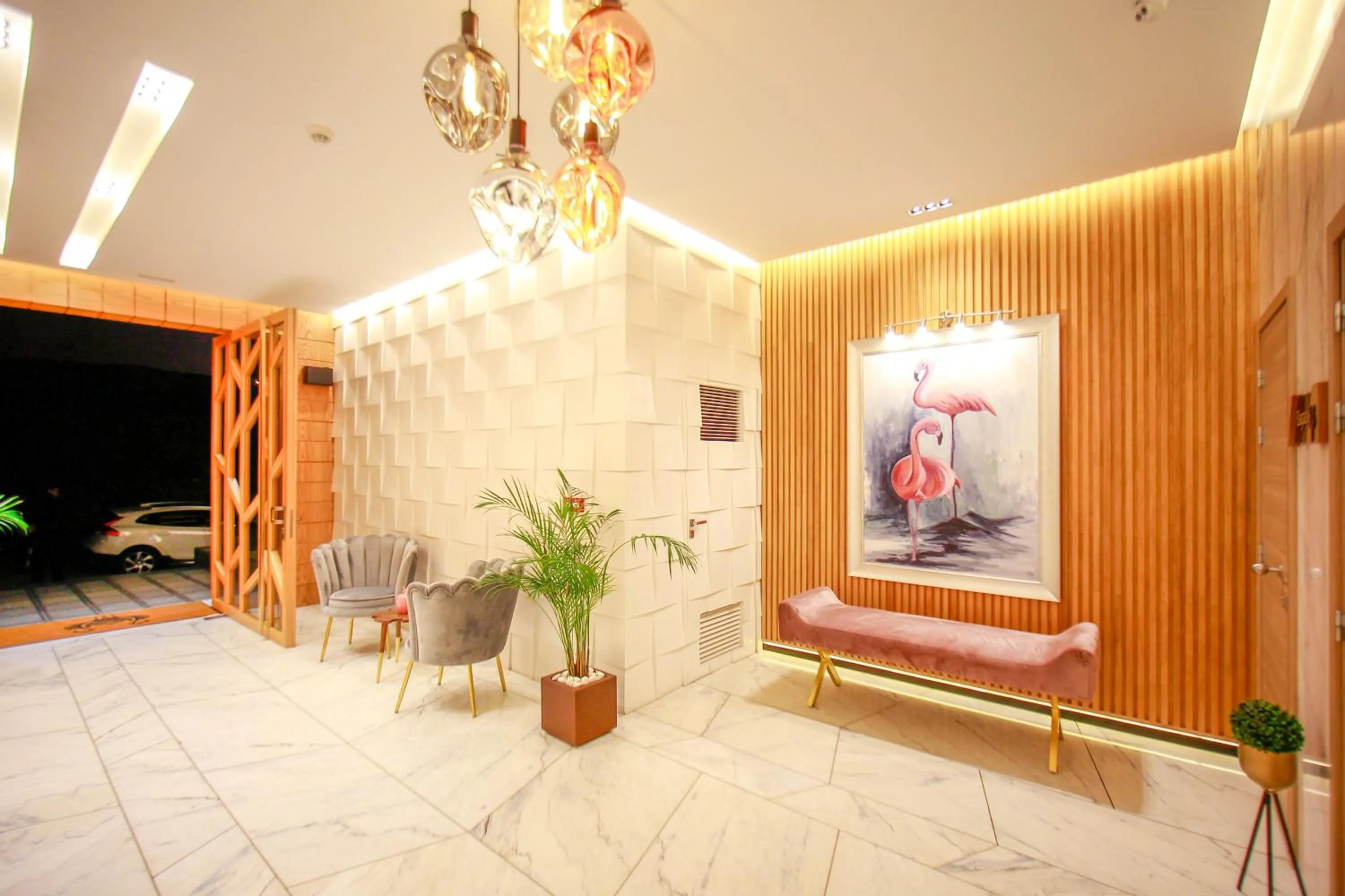 Lobby or reception in Flamant Rose Appart Hotel