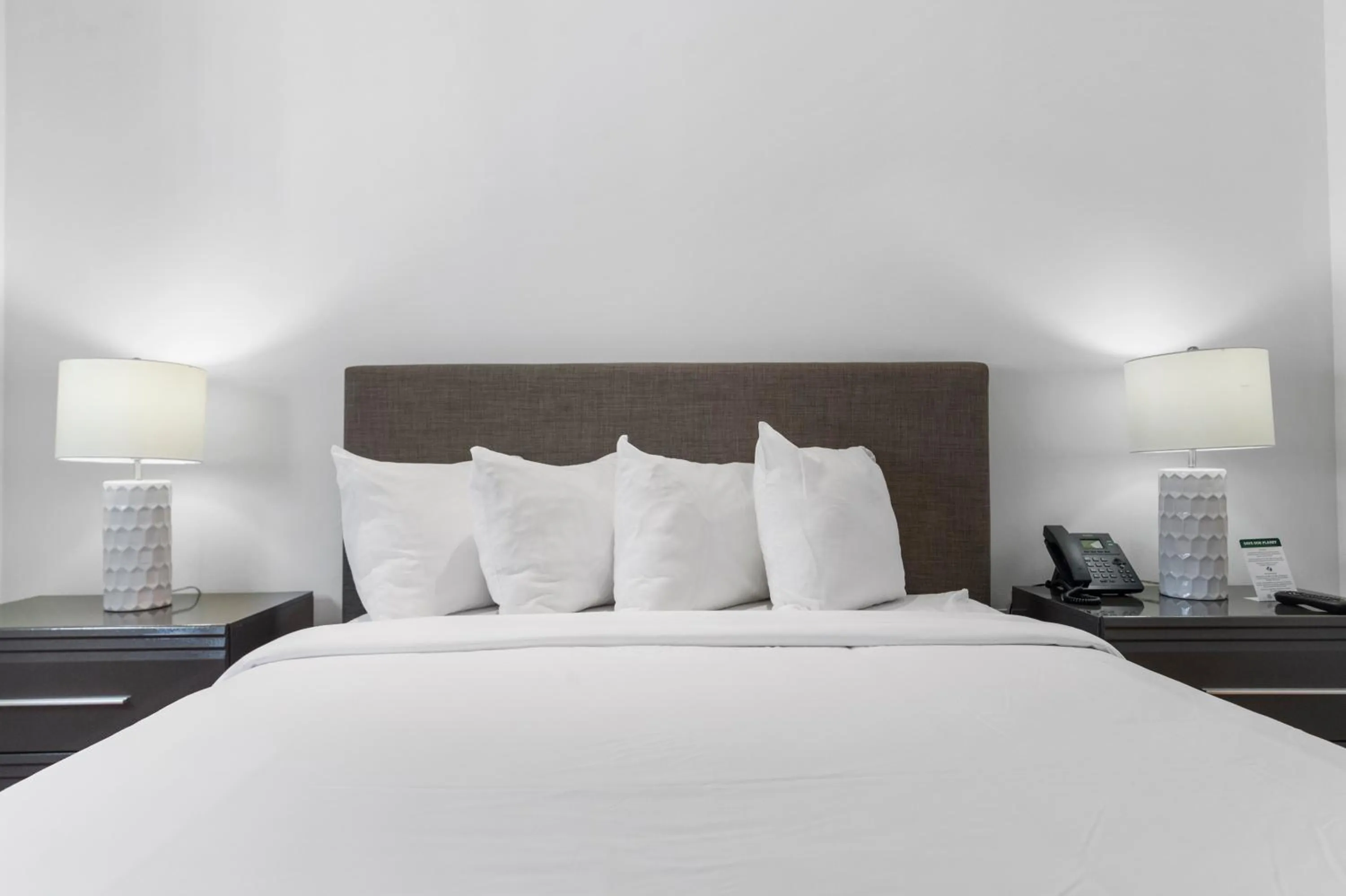 Bed in Fortune House Hotel Suites