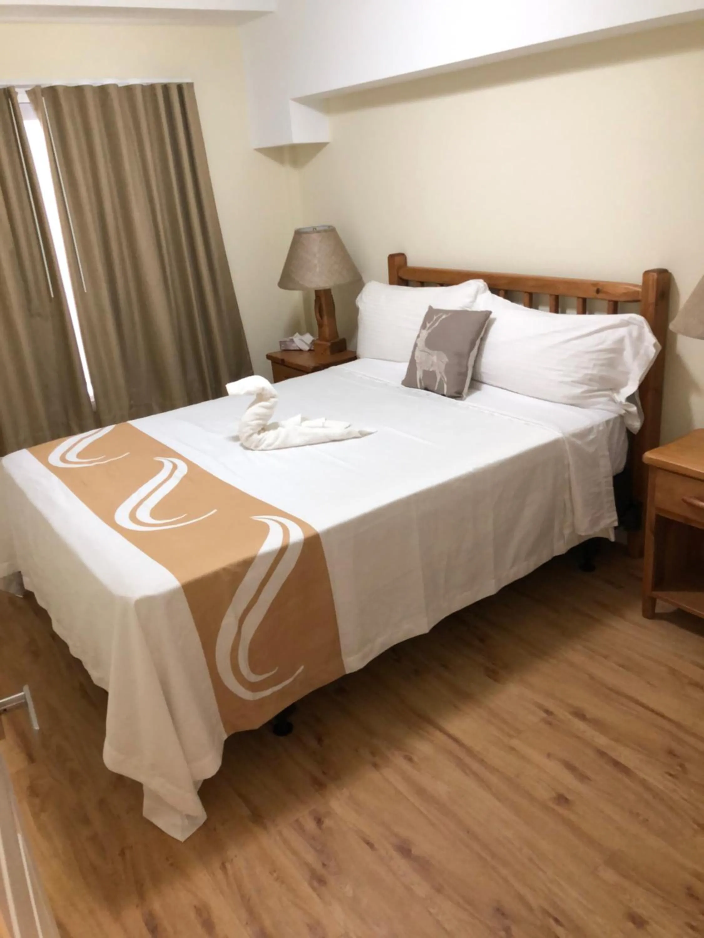 Bed in Muskoka Lakes Hotel and Resorts