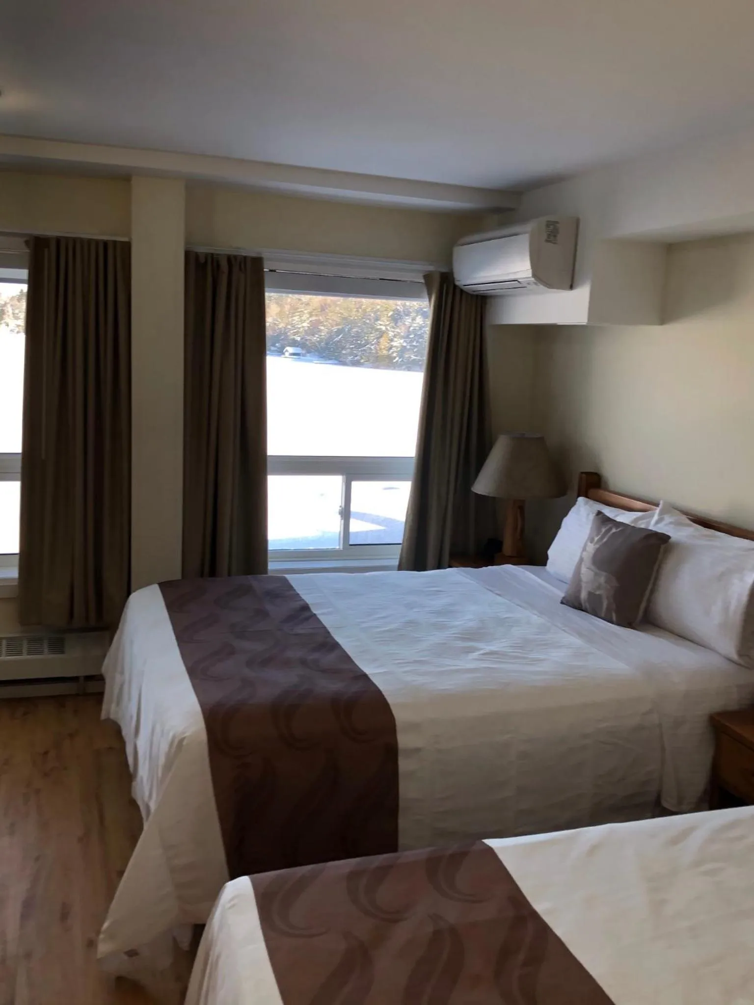Bed in Muskoka Lakes Hotel and Resorts