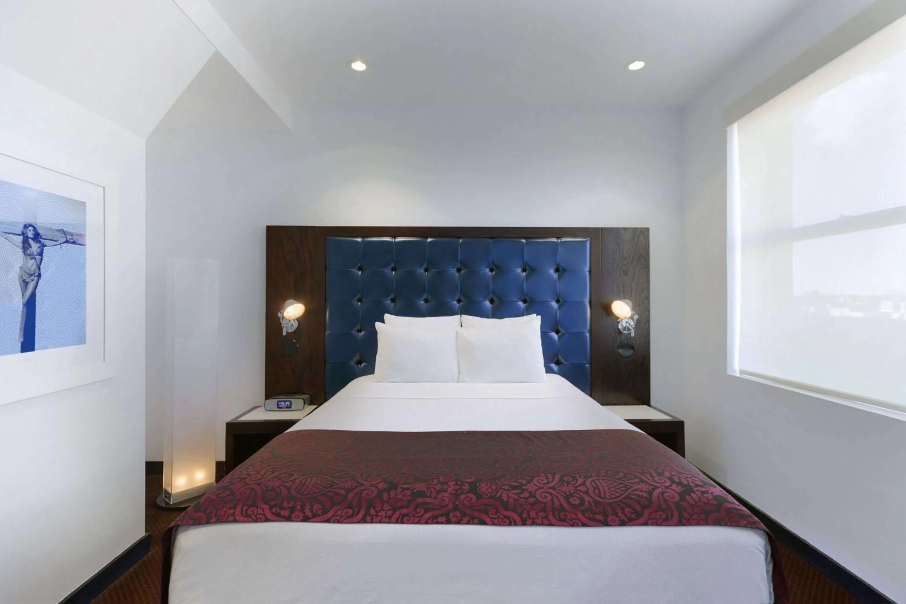 Bed in Night Hotel Broadway