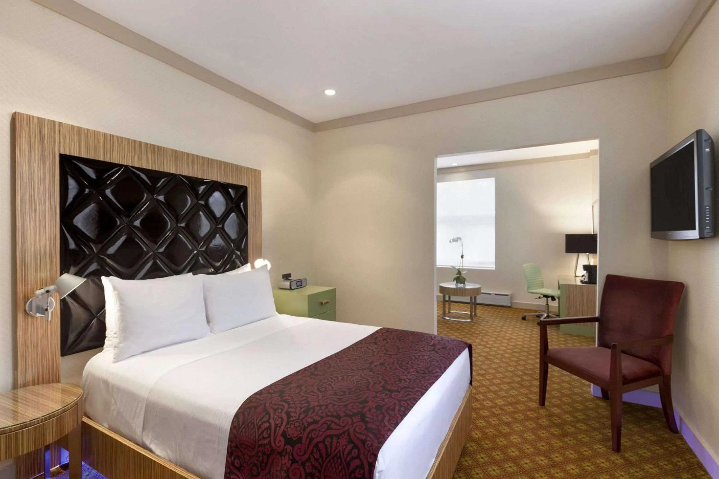 Bed in Night Hotel Broadway