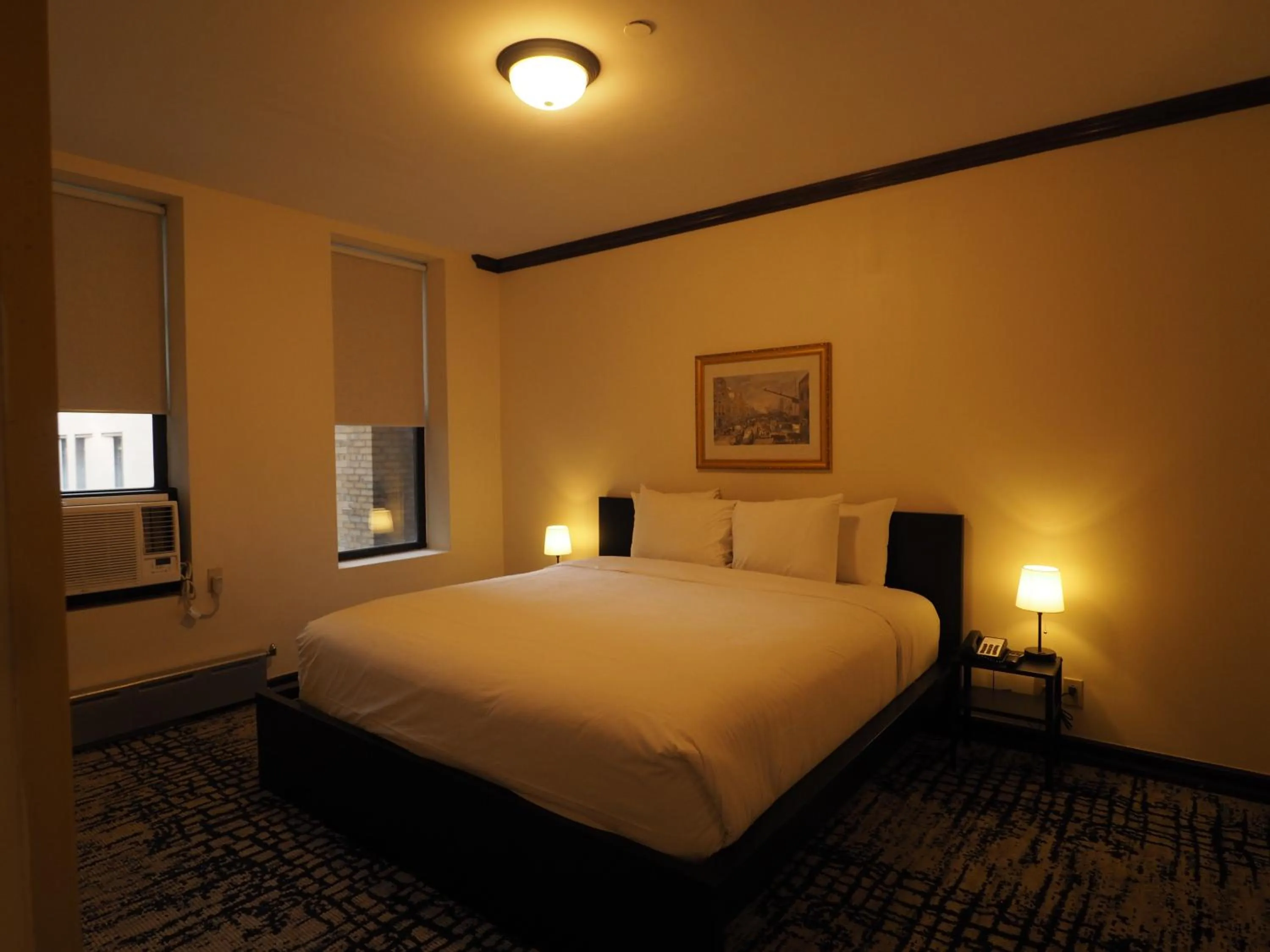 Bed in Night Hotel Broadway