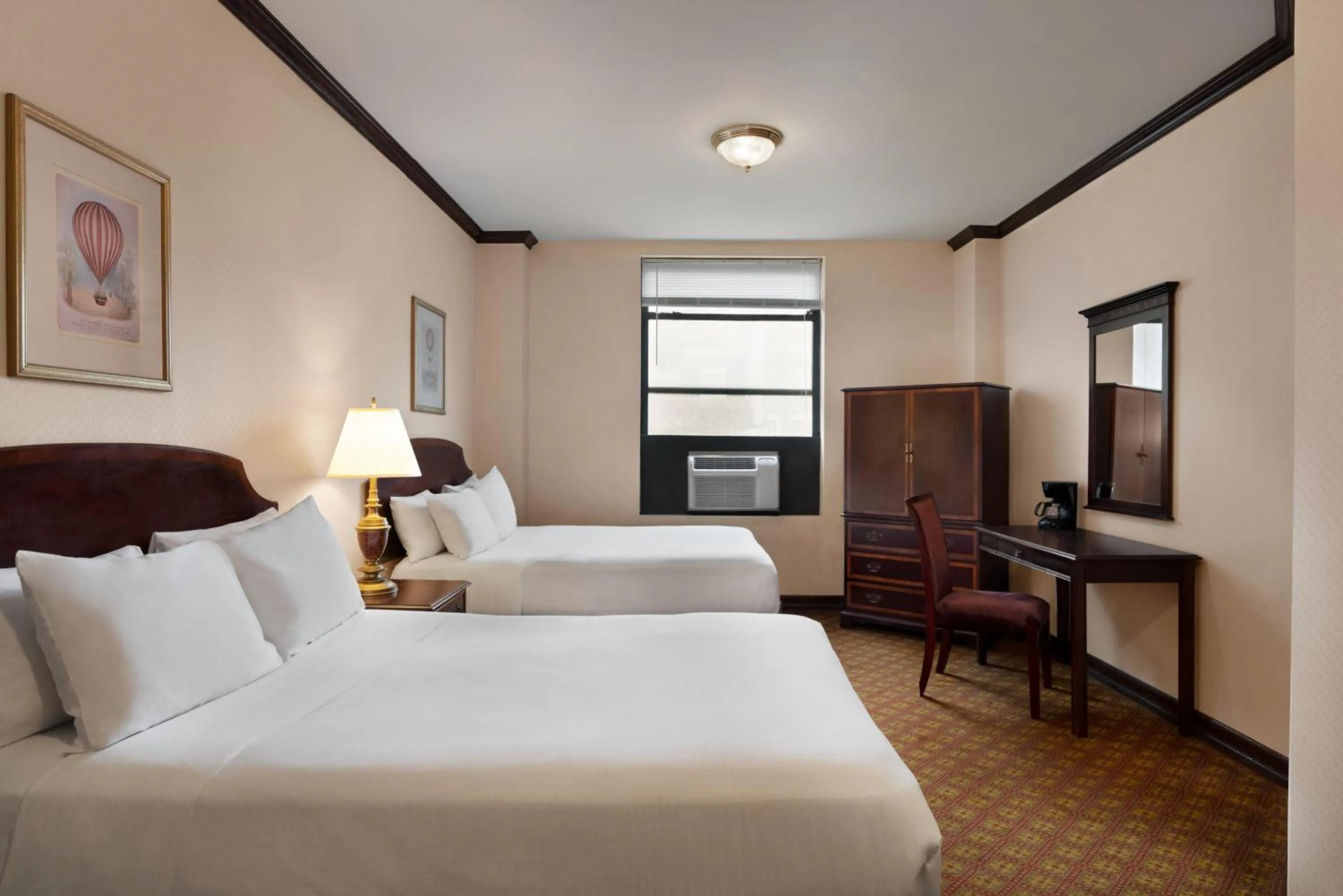 Bed in Night Hotel Broadway