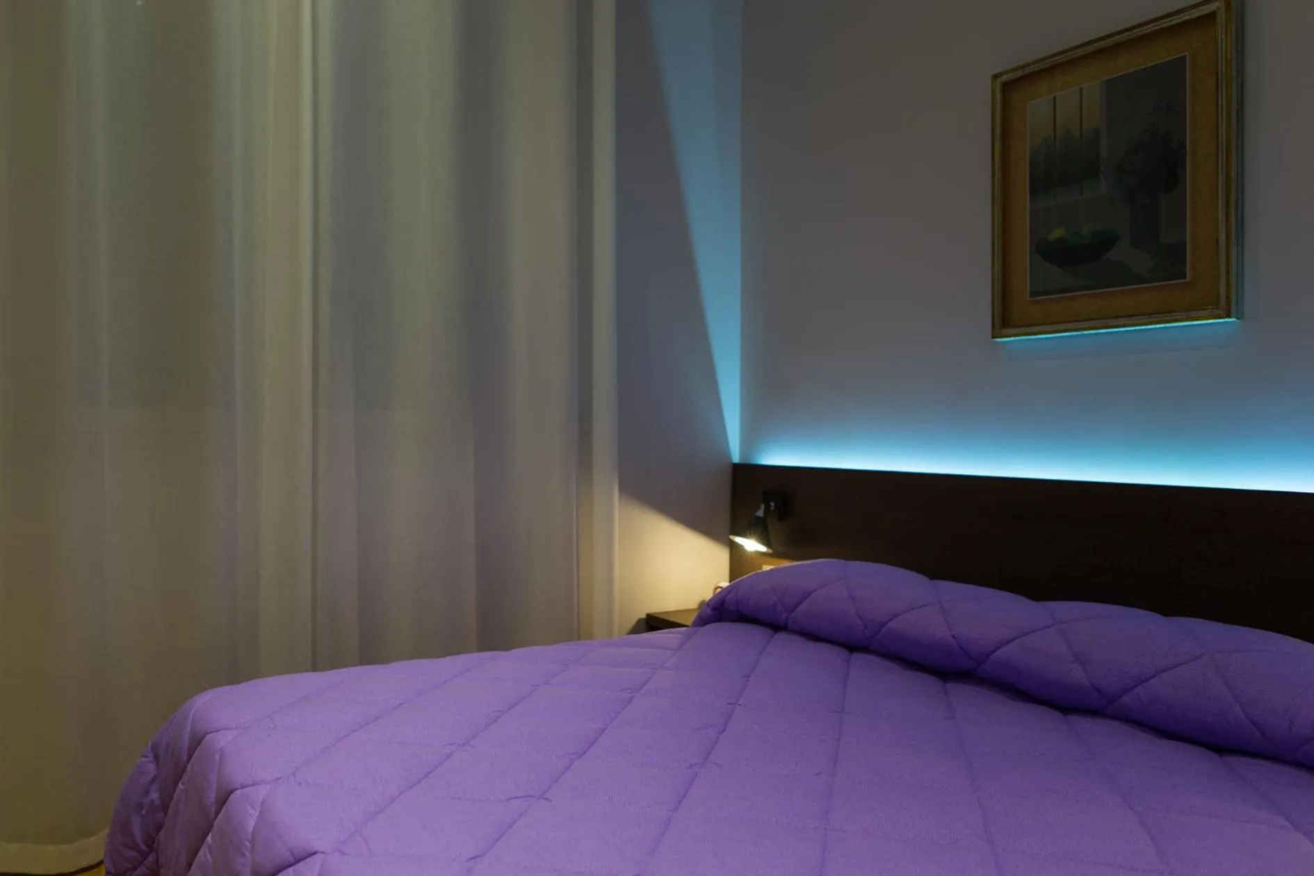 Bed in Liddo Boutique hotel