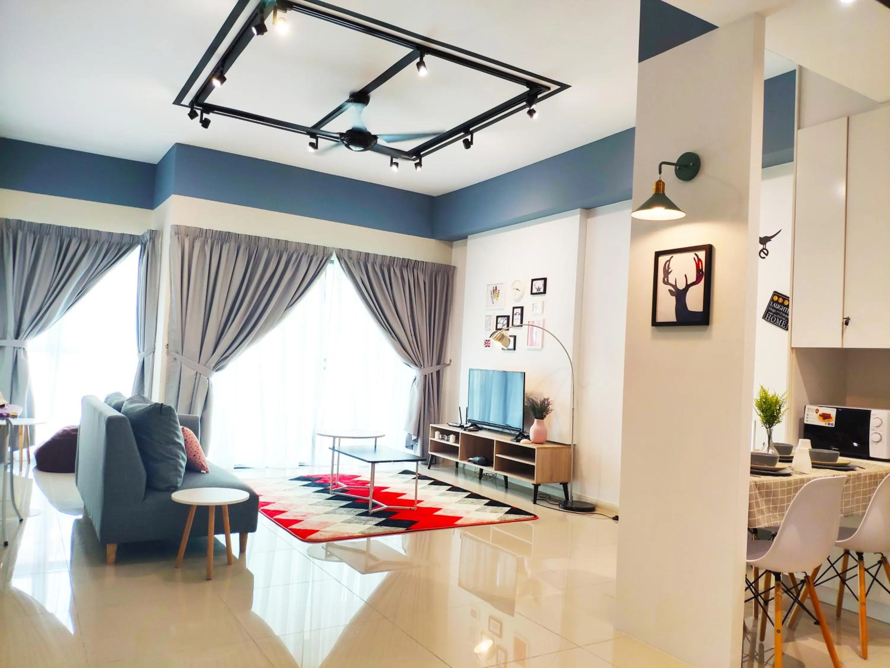 Living room in 5-Star Apartment + Infinity Pool, 4 pax, 1 min to Jaya One