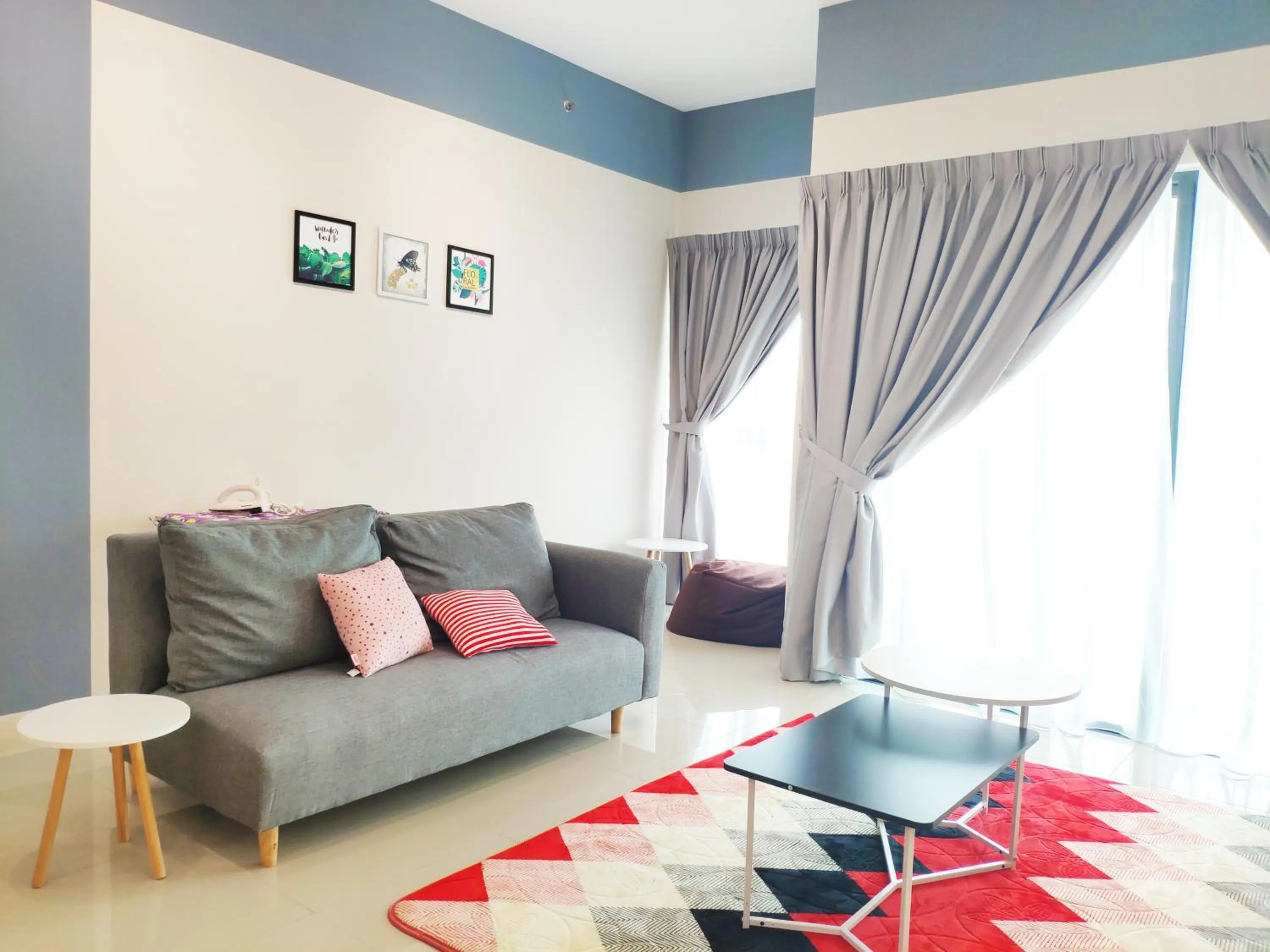 Living room in 5-Star Apartment + Infinity Pool, 4 pax, 1 min to Jaya One
