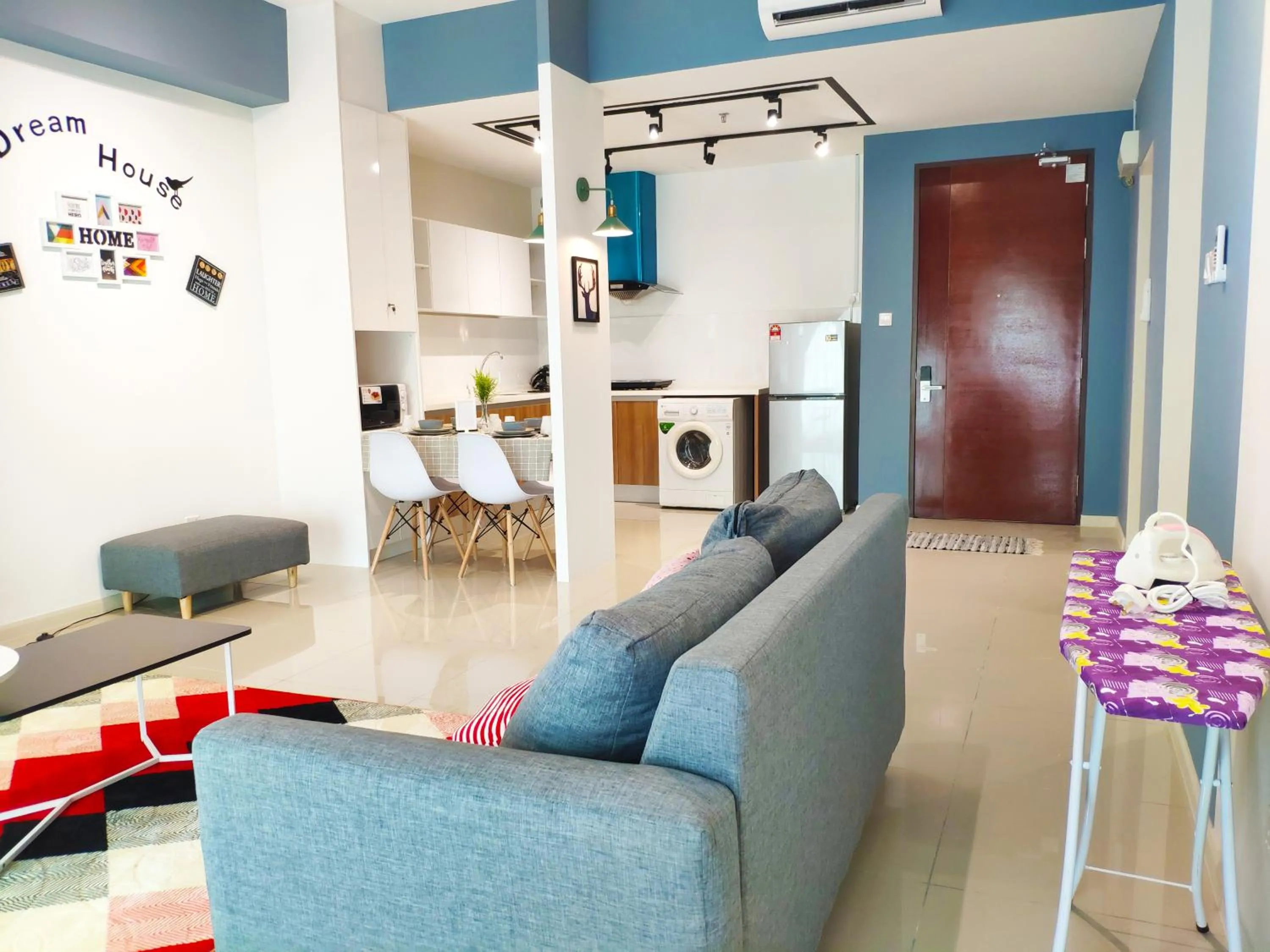 Living room in 5-Star Apartment + Infinity Pool, 4 pax, 1 min to Jaya One