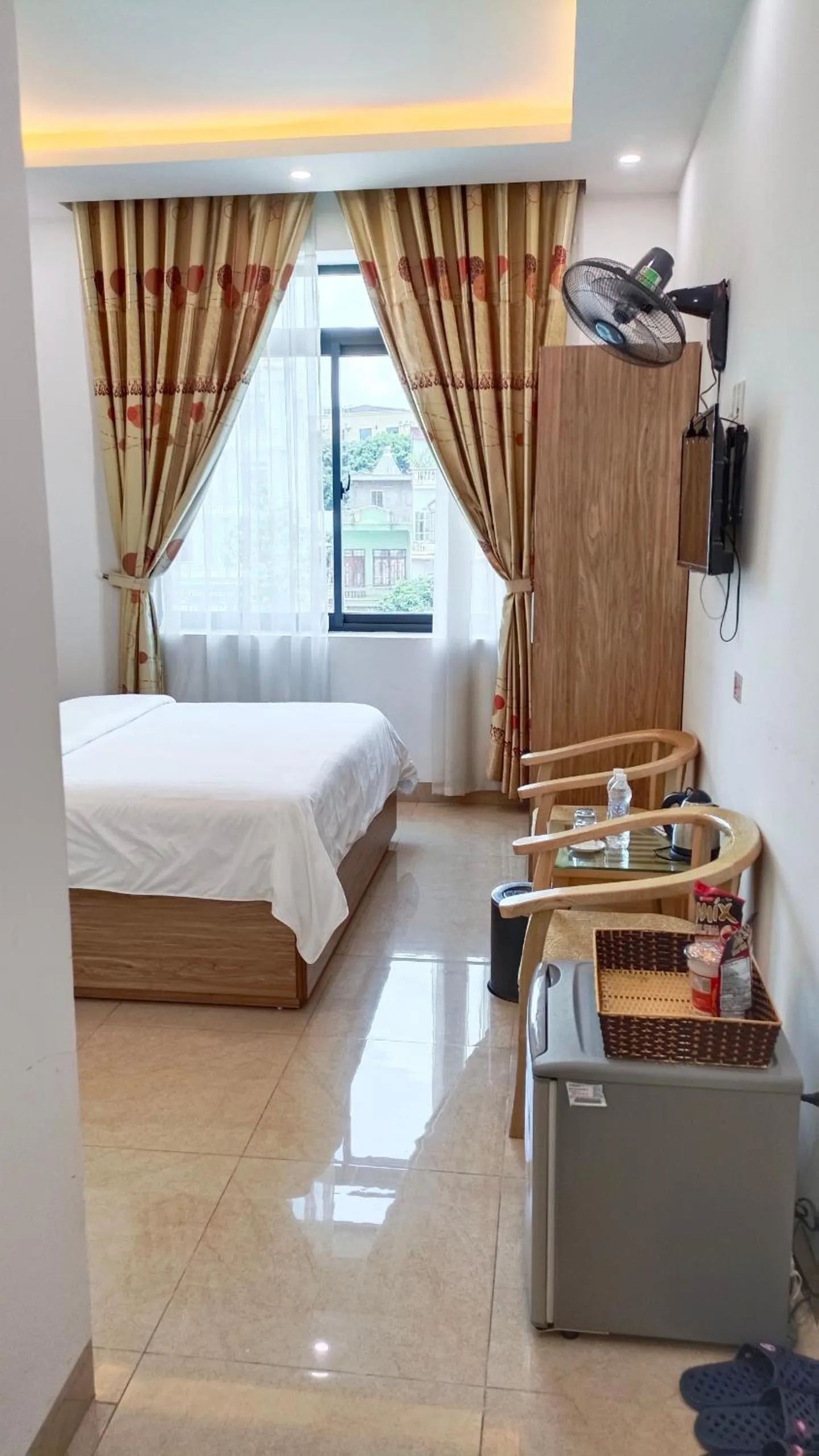 Bed in Galaxy Grand Hotel