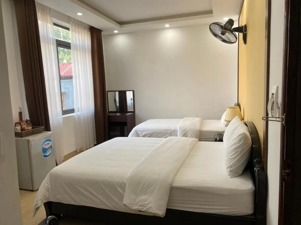 Bed in Galaxy Grand Hotel