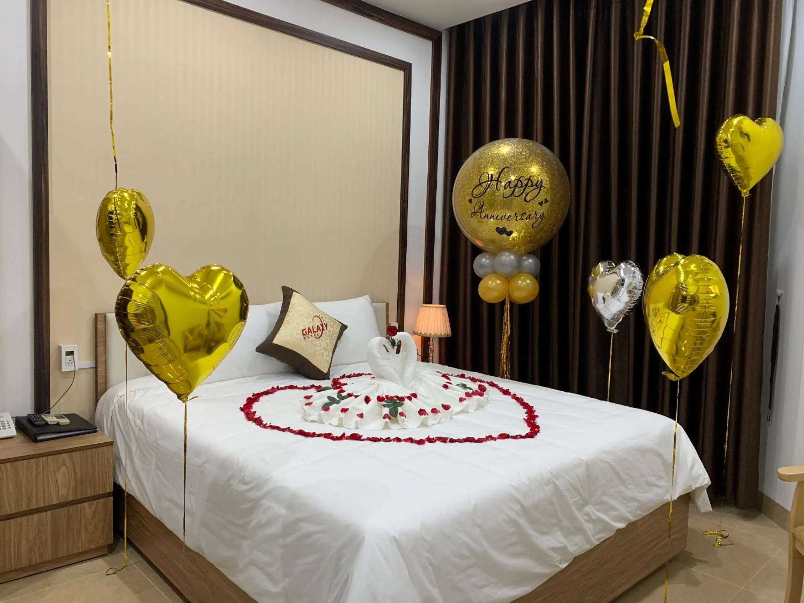 Bed in Galaxy Grand Hotel