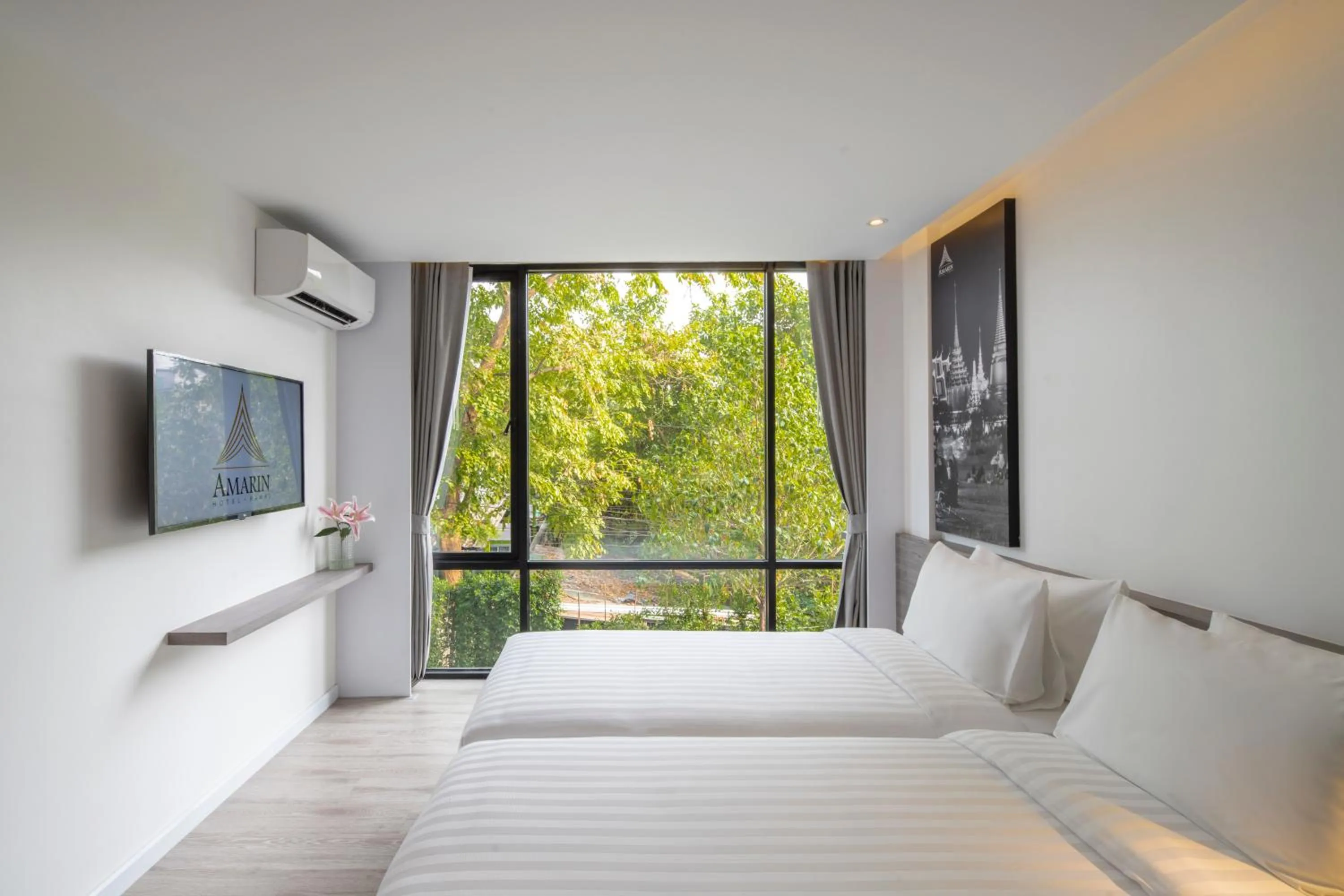 Bed in Amarin Hotel Rama 8