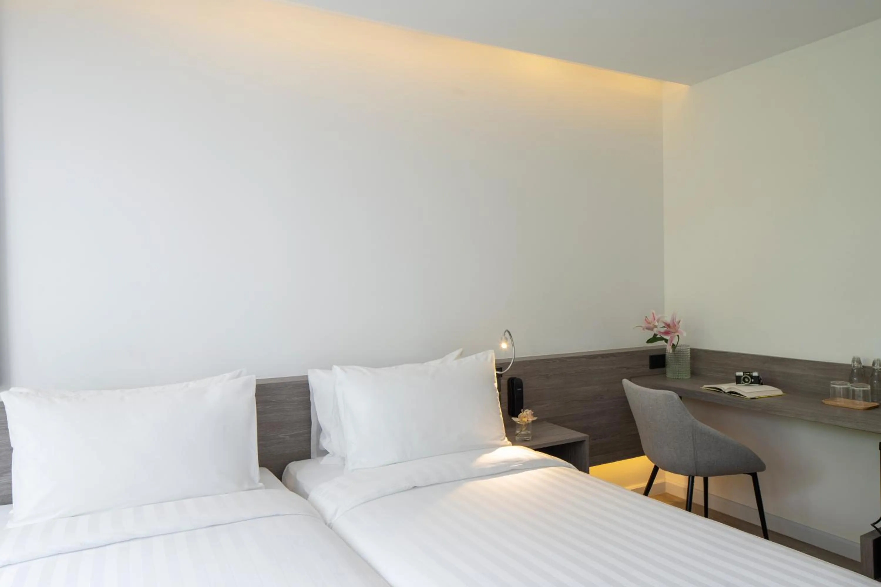 Bed in Amarin Hotel Rama 8