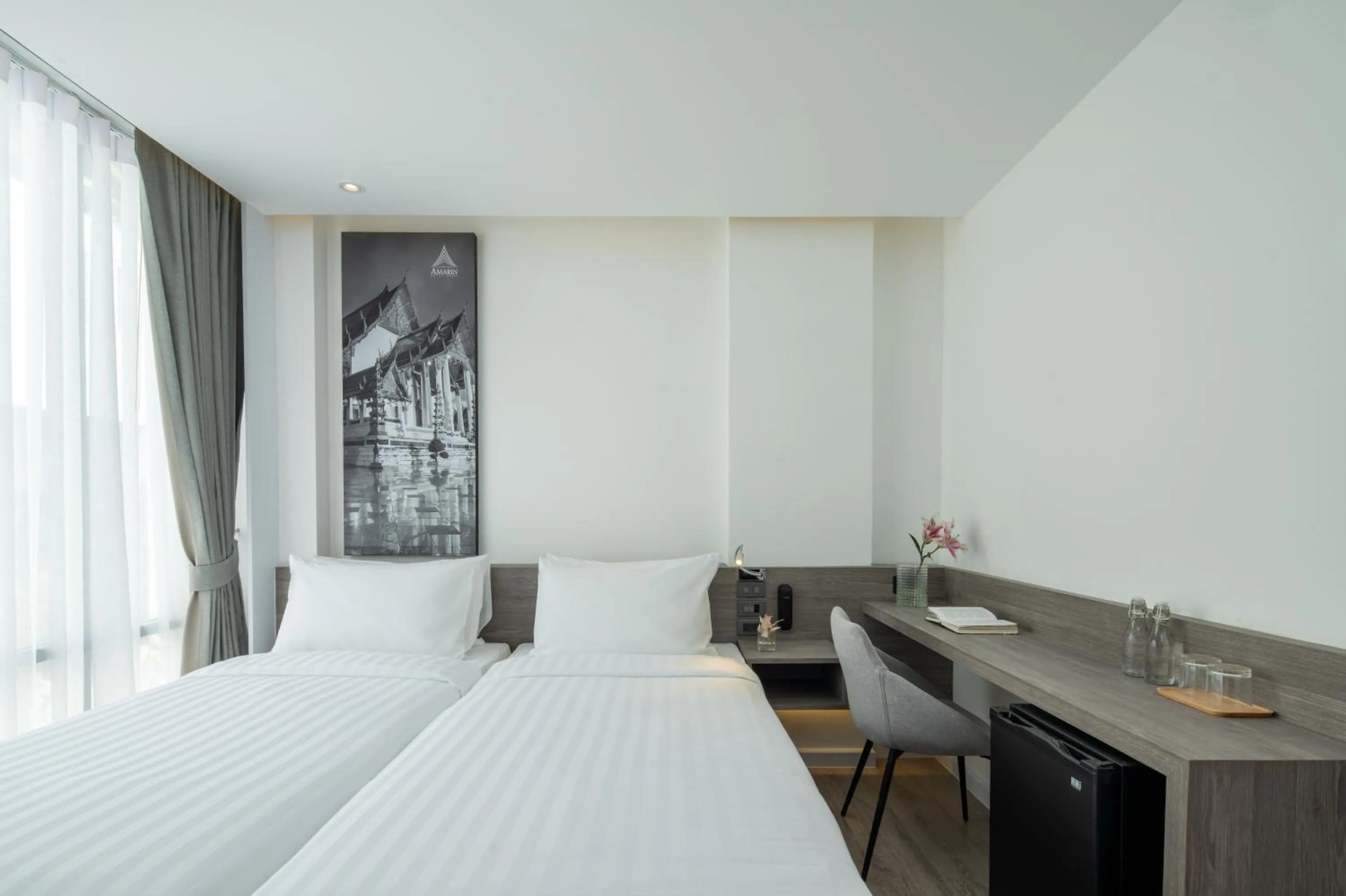 Bed in Amarin Hotel Rama 8