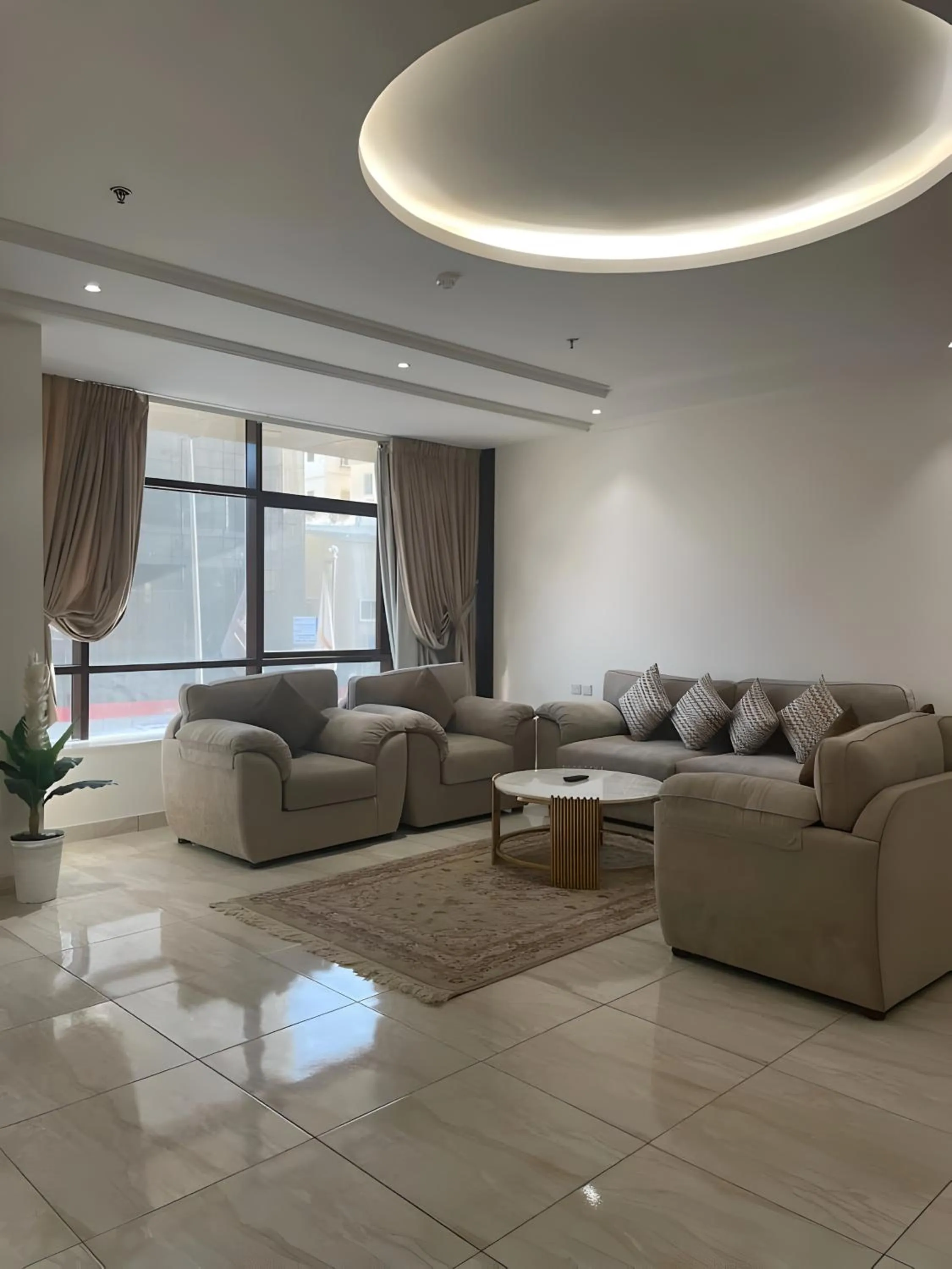 Communal lounge/ TV room in Hayat Al Rose Hotel Appartment