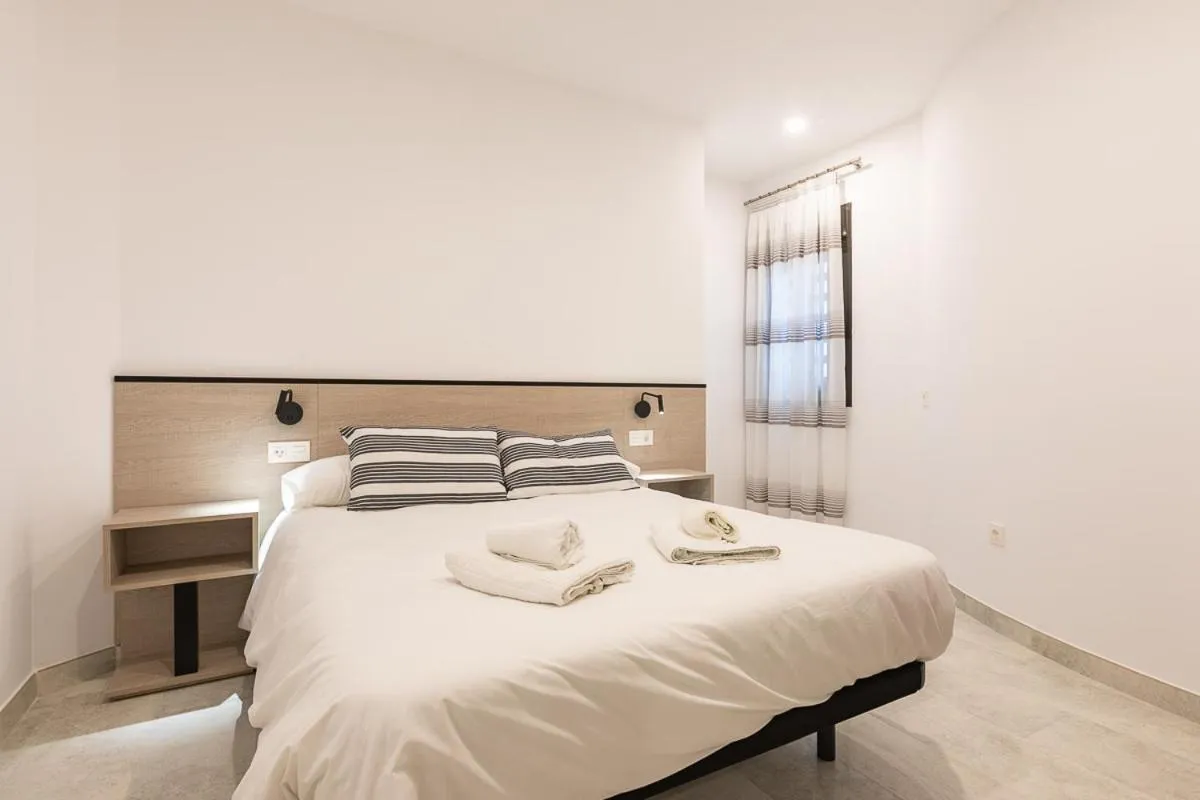 Bedroom, Bed in Apartamentos Guerrero 3