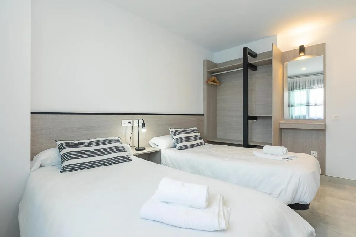 Bedroom, Bed in Apartamentos Guerrero 3