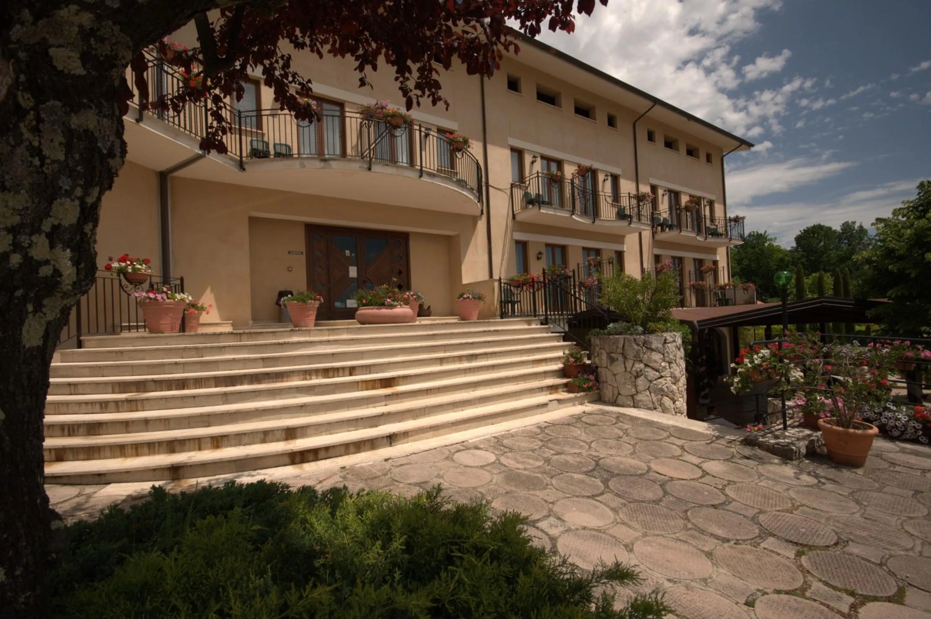 Property building in Hotel La Grotte