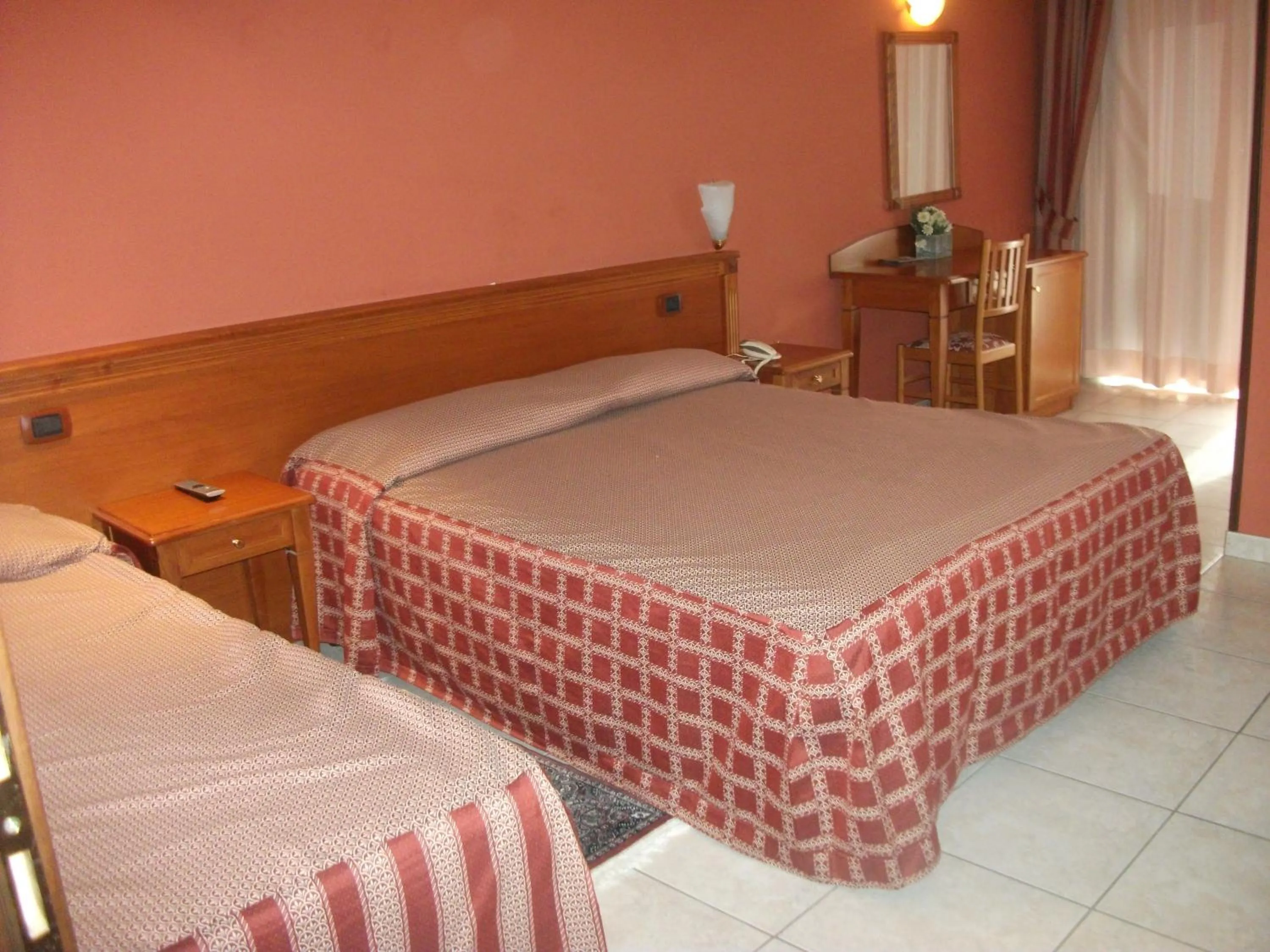 Bed in Hotel La Grotte