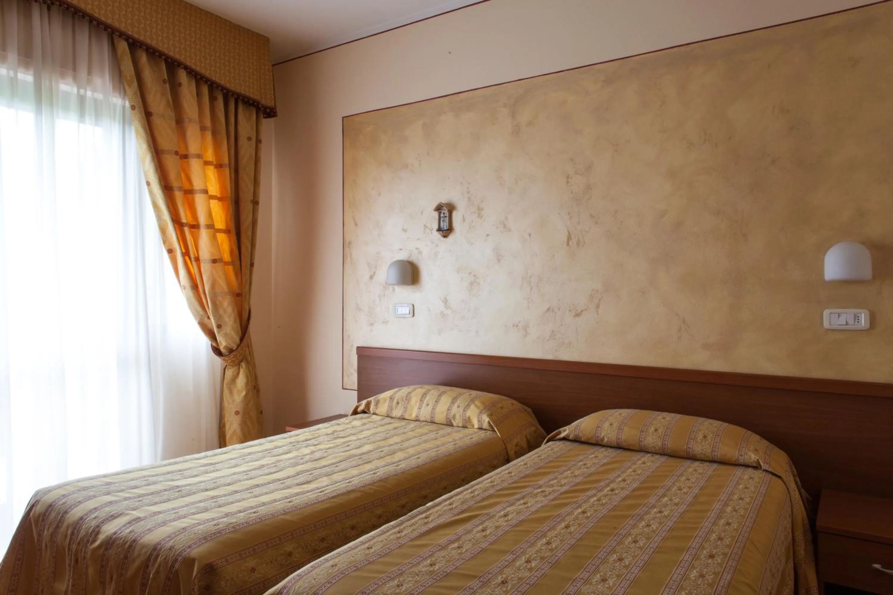 Decorative detail, Bed in Hotel Fabbrini