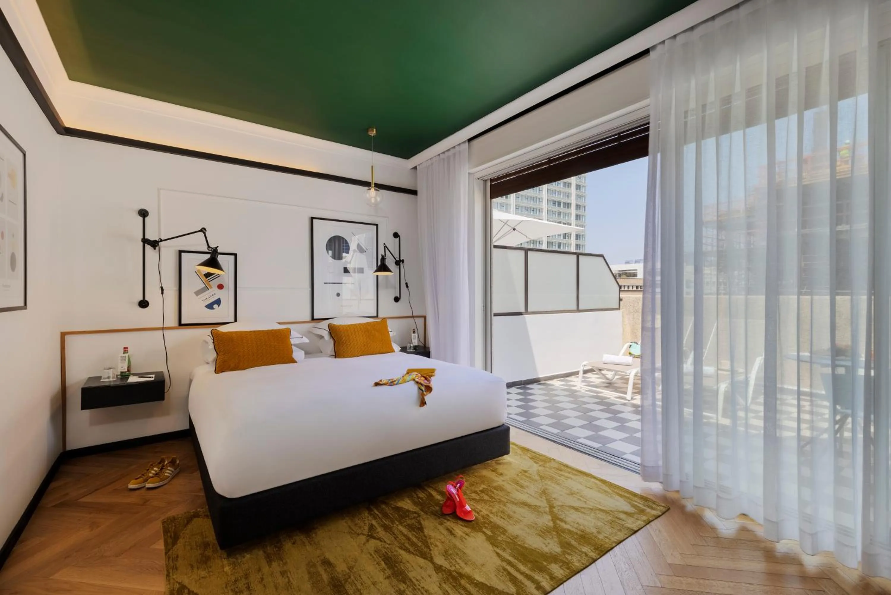 Balcony/Terrace, Bed in Theodor Brown Rothschild Tel-Aviv, a member of Brown Hotels