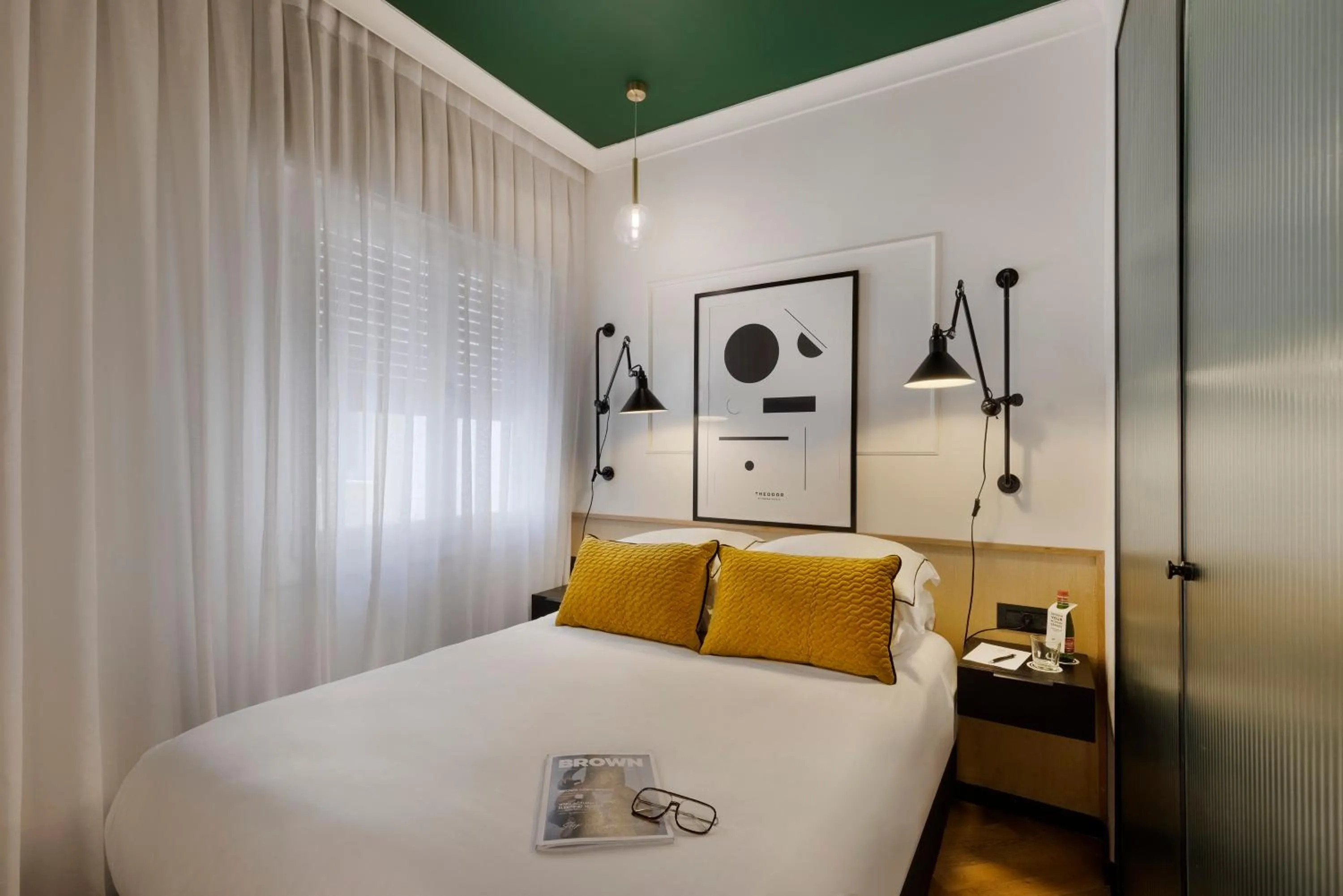Bed in Theodor Brown Rothschild Tel-Aviv, a member of Brown Hotels