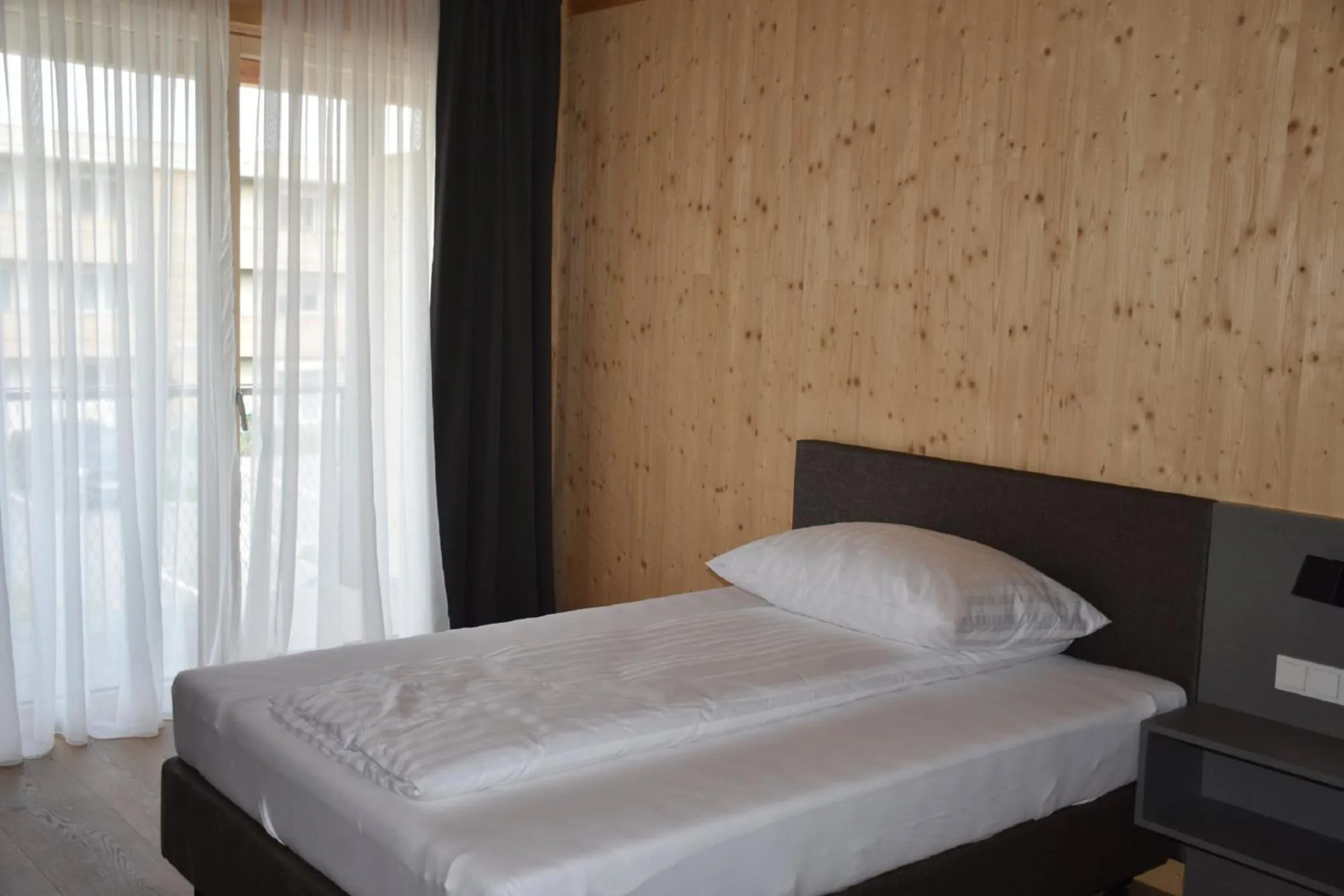 Bed in GästeHAUS & HOFladen Familie Öllerer