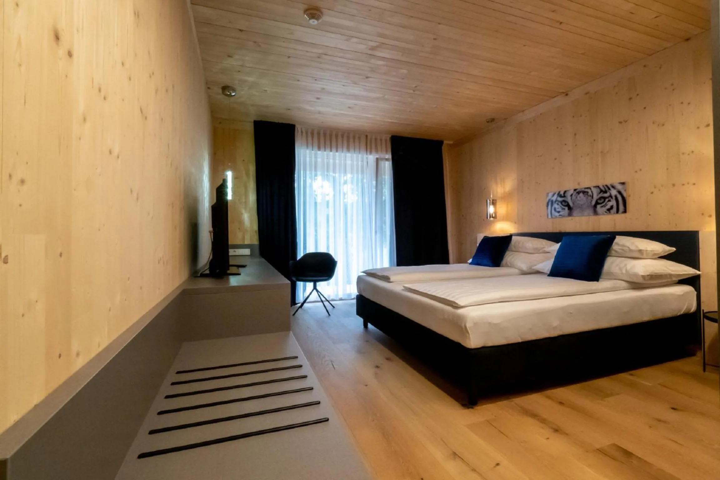 Photo of the whole room, Bed in GästeHAUS & HOFladen Familie Öllerer