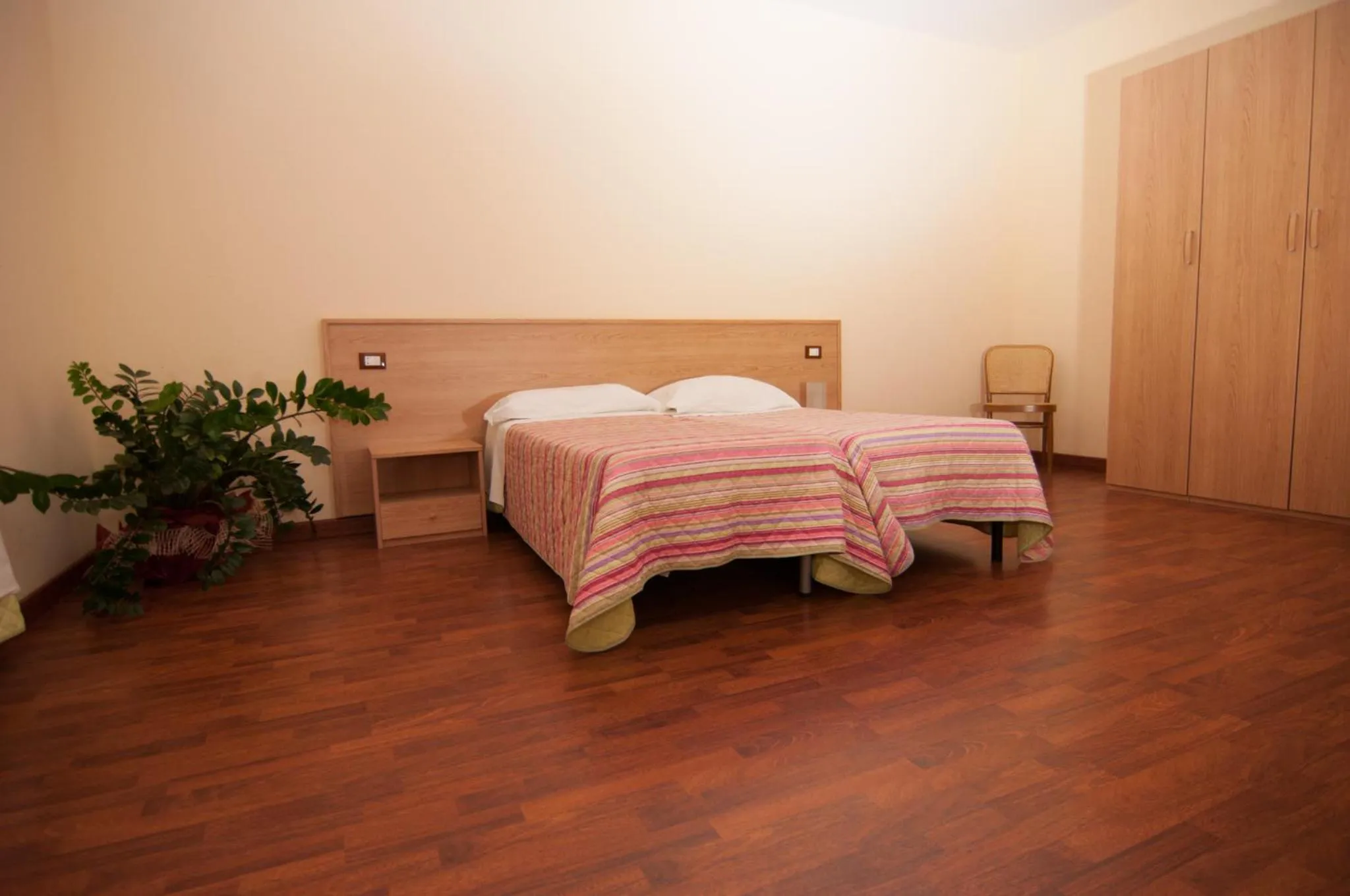 Bed in Albergo Conca D'Oro