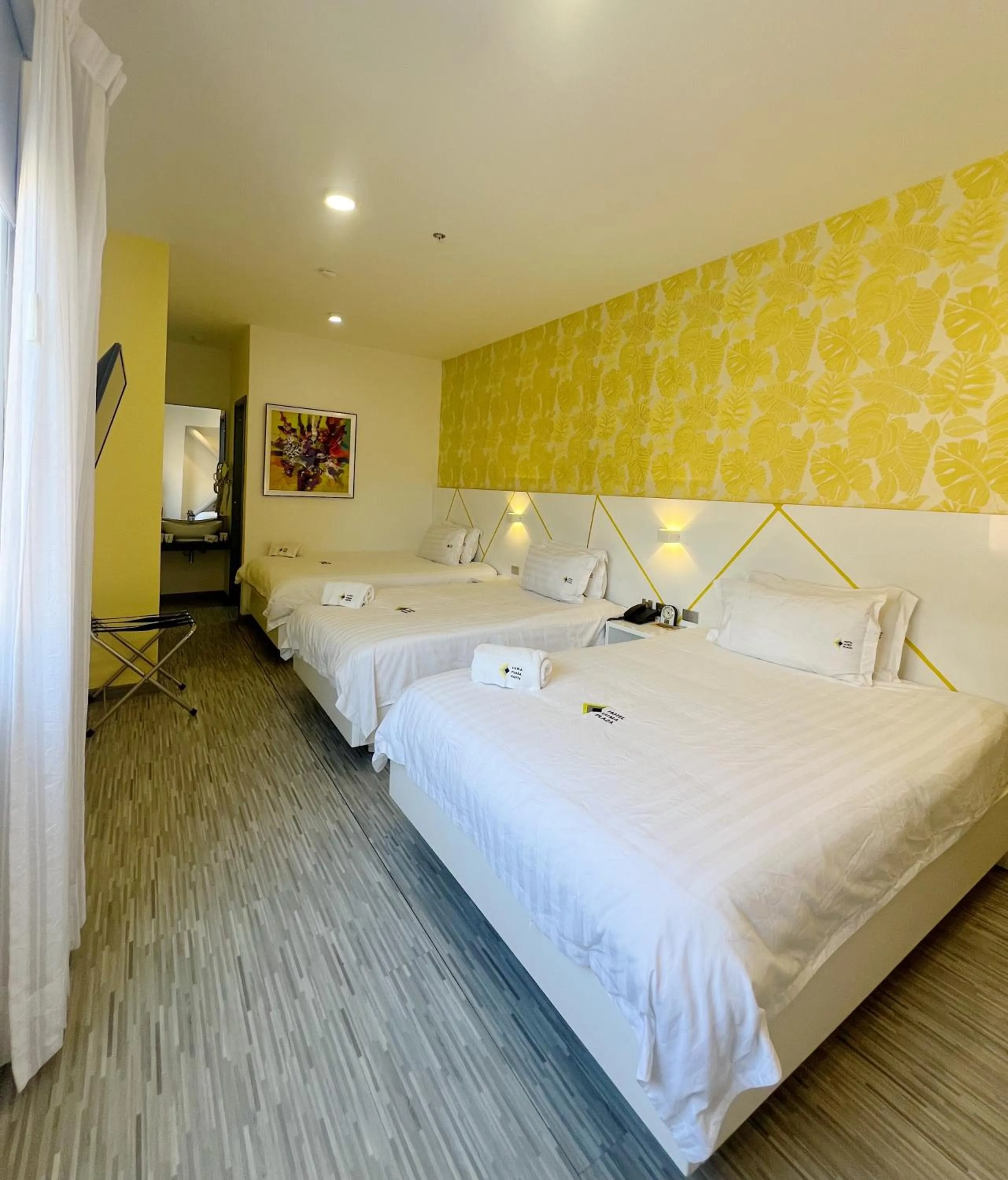 Photo of the whole room, Bed in Luma Plaza Hotel